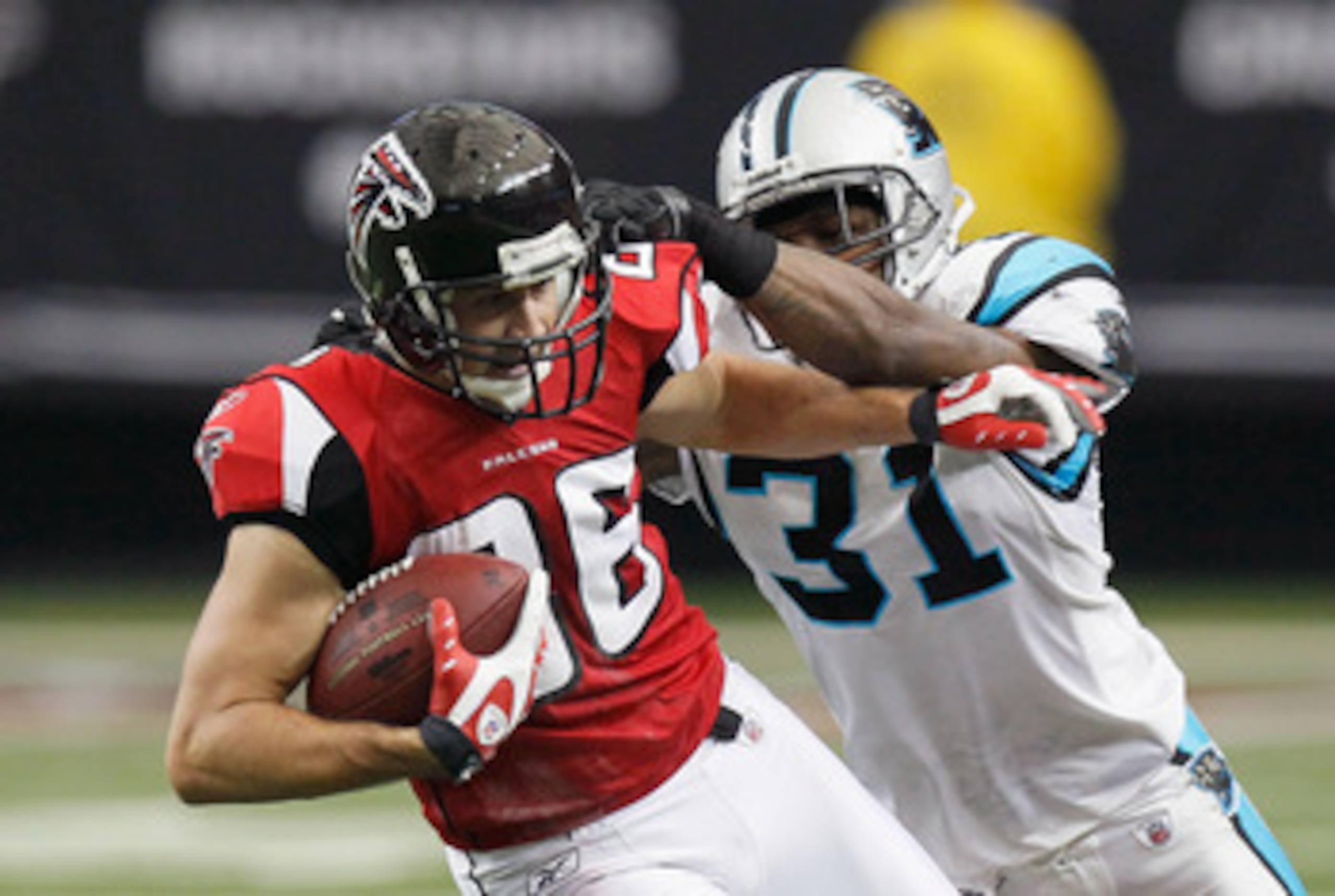 ATLANTA, GA - JANUARY 02:  Brian Finneran #86 of the Atlanta Falcons against Richard Marshall #31 of the Carolina Panthers at Georgia Dome on January 2, 2011 in Atlanta, Georgia.  (Photo by Kevin C. Cox/Getty Images)