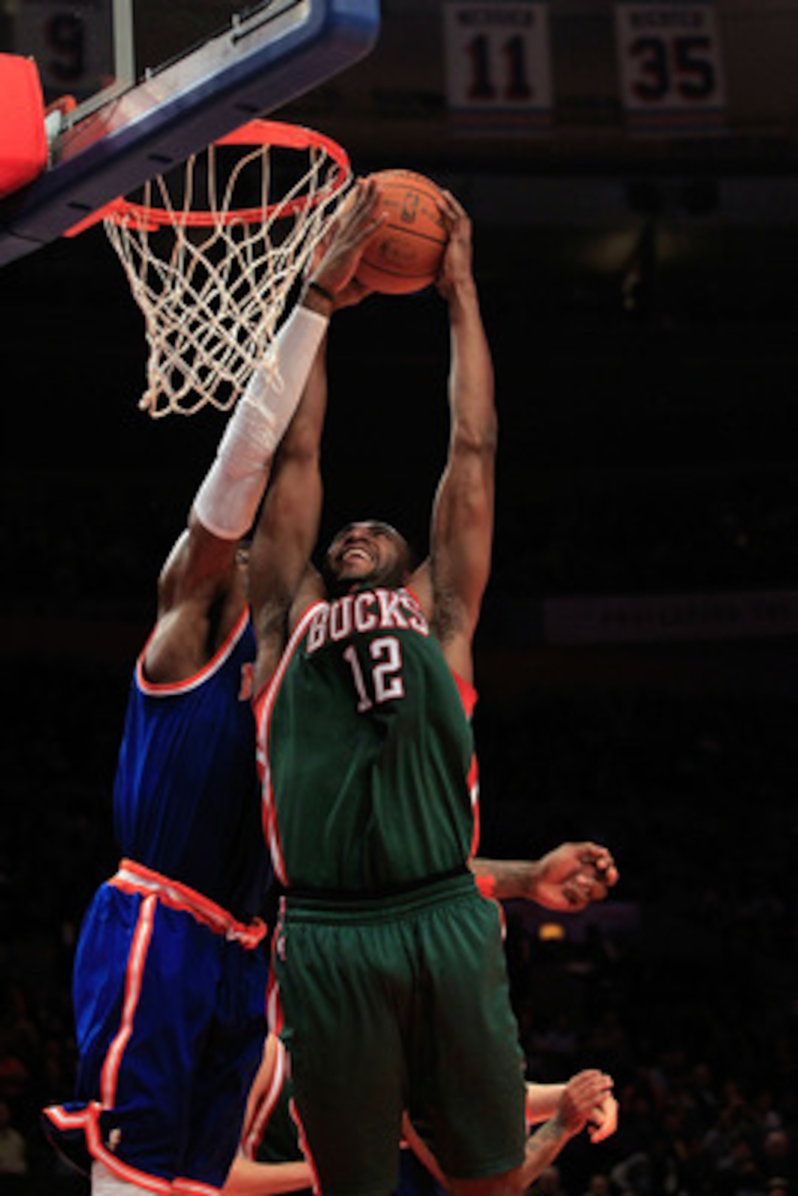 NEW YORK, NY - FEBRUARY 23:  Luc Mbah a Moute #12 of the Milwaukee Bucks goes up to the basket against the New York Knicks at Madison Square Garden on February 23, 2011 in New York City. NOTE TO USER: User expressly acknowledges and agrees that, by downlo