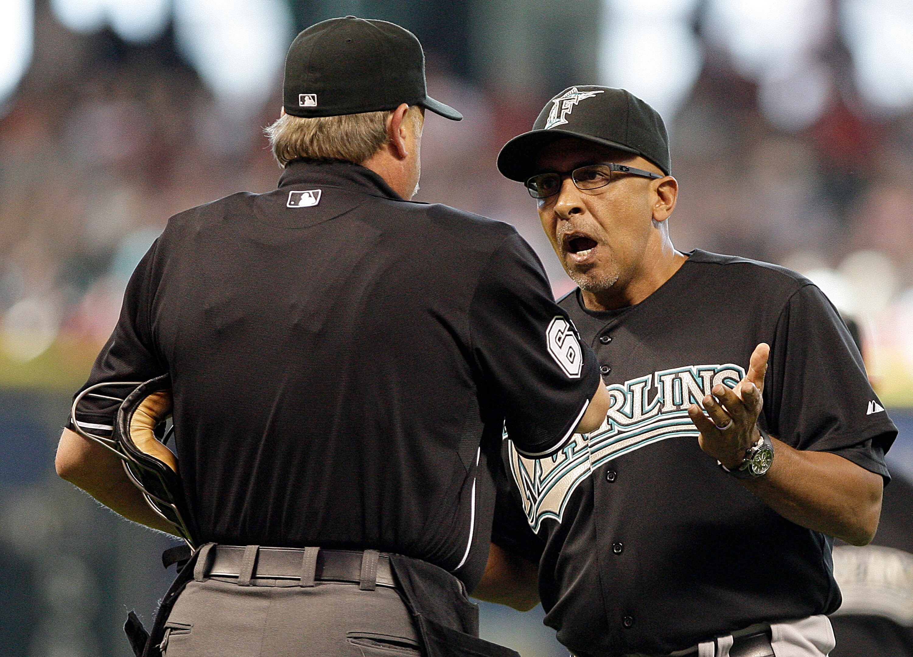 HOUSTON, TX - APRIL 10: Manager Edwin Rodriguez of the Florida Marlins argues with home plate umpire Jim Joyce after Marlins pitcher Edward Mujica # 34 was ejected from the game for hitting Bill Hall #22 of the Houston Astros with a pitch in the seventh i