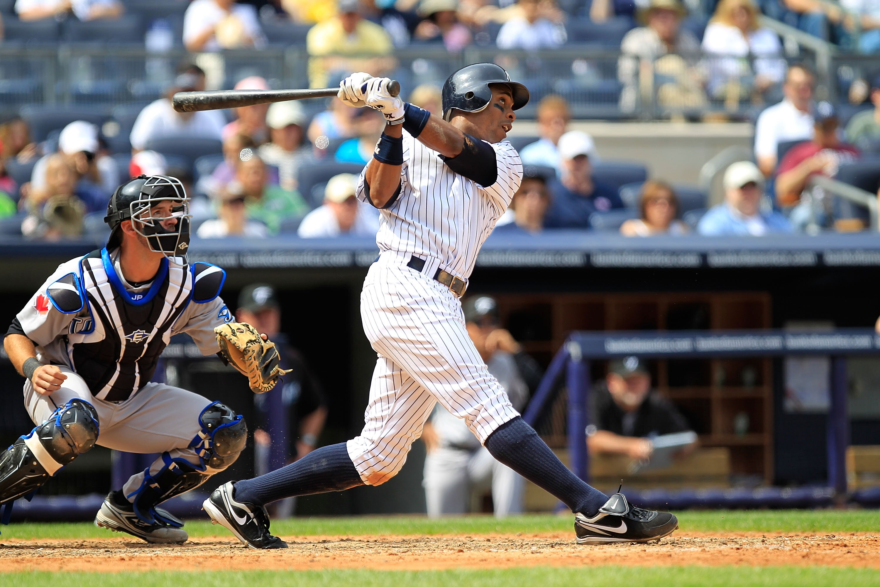 NEW YORK, NY - MAY 01:  Curtis Granderson #14 of the New York Yankees hits a three run home run in the fifth inning against the Toronto Blue Jays at Yankee Stadium on May 1, 2011 in the Bronx borough of New York City.  (Photo by Chris Trotman/Getty Images