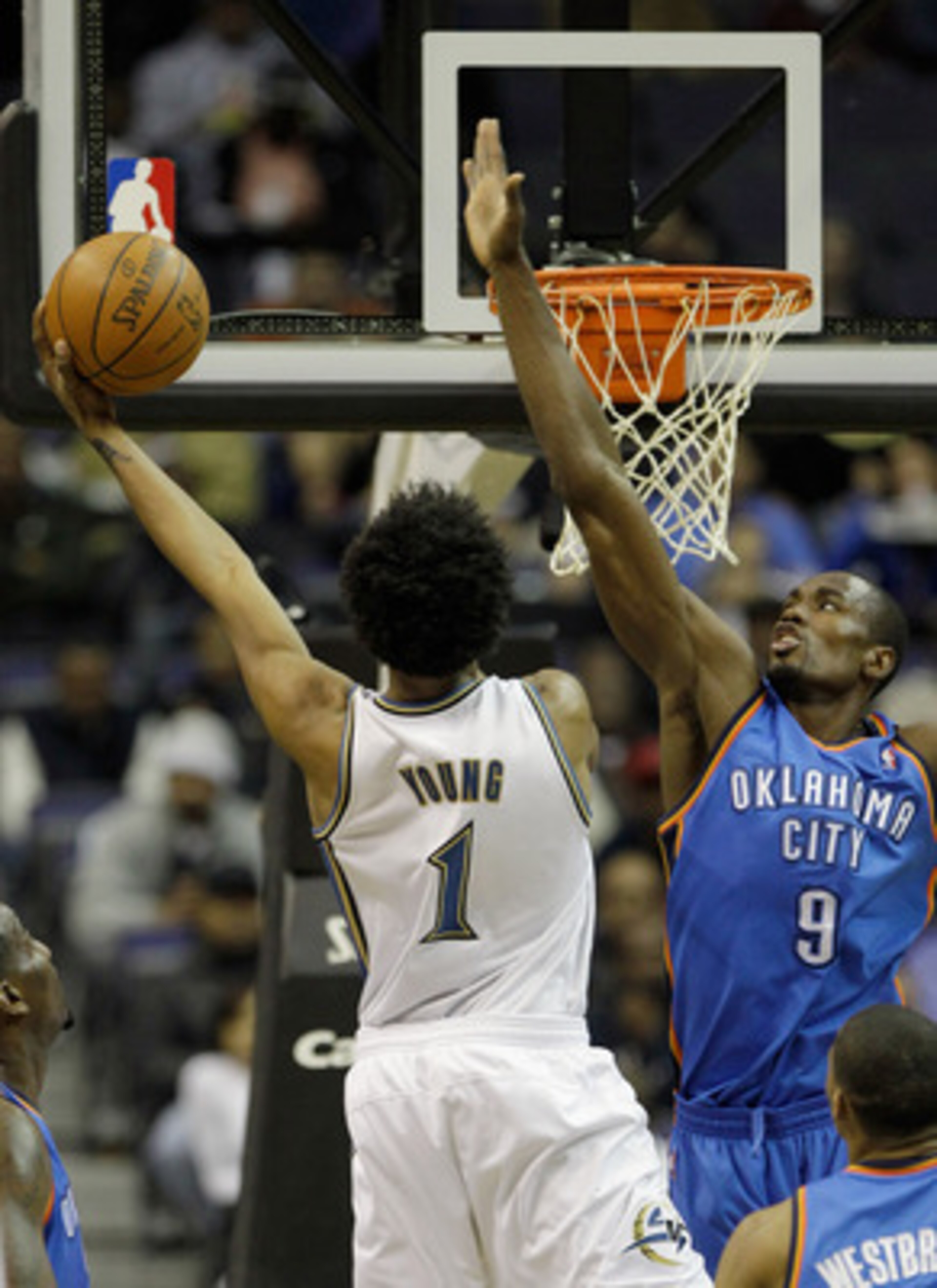 WASHINGTON, DC - MARCH 14: Nick Young #1 of the Washington Wizards puts up a shot in front of Serge Ibaka #9 of the Oklahoma City Thunder during the first half at the Verizon Center on March 14, 2011 in Washington, DC. NOTE TO USER: User expressly acknowl