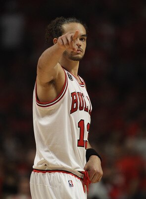 CHICAGO, IL - MAY 10: Joakim Noah #13 of the Chicago Bulls points to family in the stands before taking on Atlanta Hawks in Game Five of the Eastern Conference Semifinals in the 2011 NBA Playoffs at the United Center on May 10, 2011 in Chicago, Illinois. 