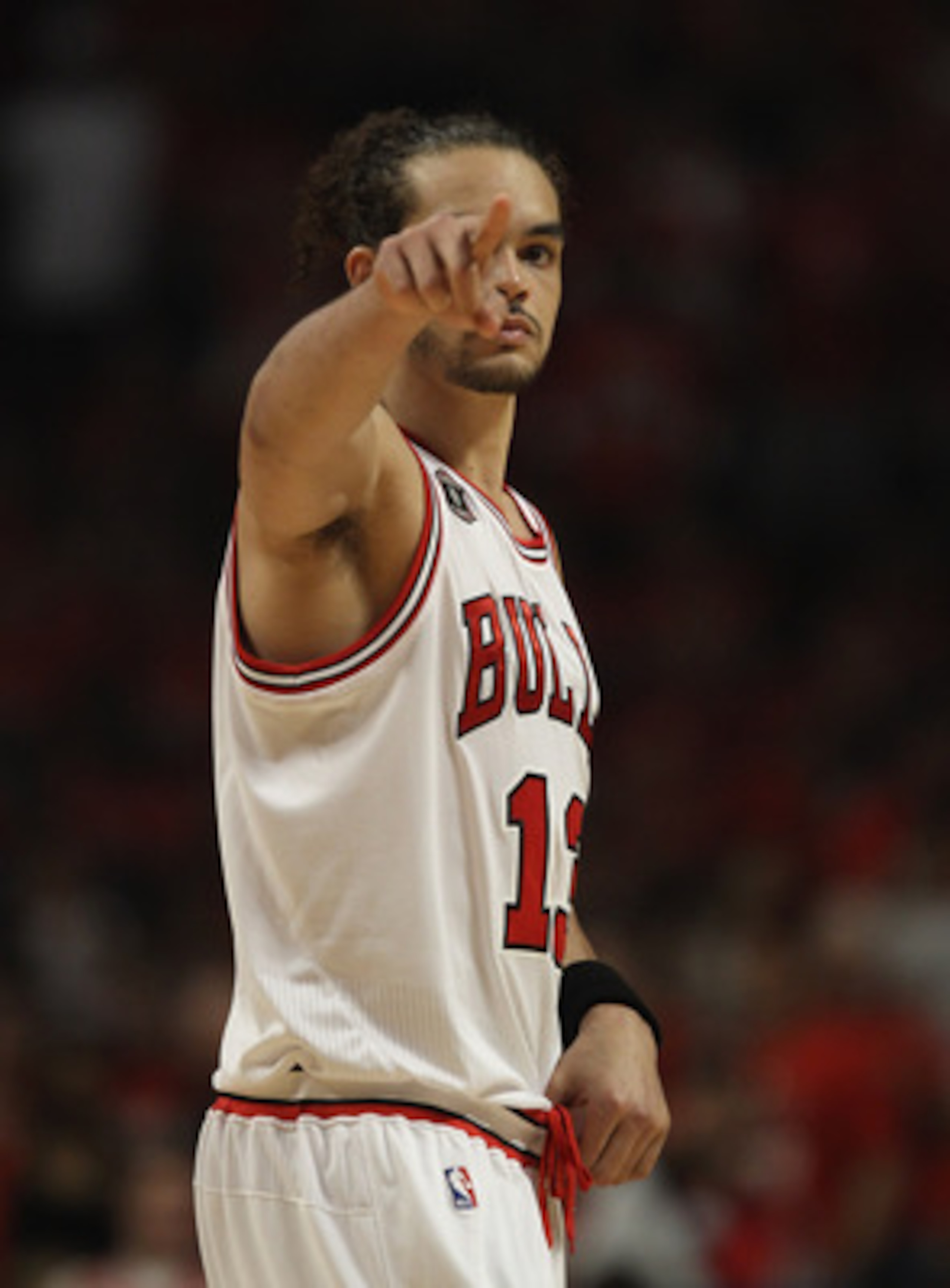 CHICAGO, IL - MAY 10: Joakim Noah #13 of the Chicago Bulls points to family in the stands before taking on Atlanta Hawks in Game Five of the Eastern Conference Semifinals in the 2011 NBA Playoffs at the United Center on May 10, 2011 in Chicago, Illinois. 