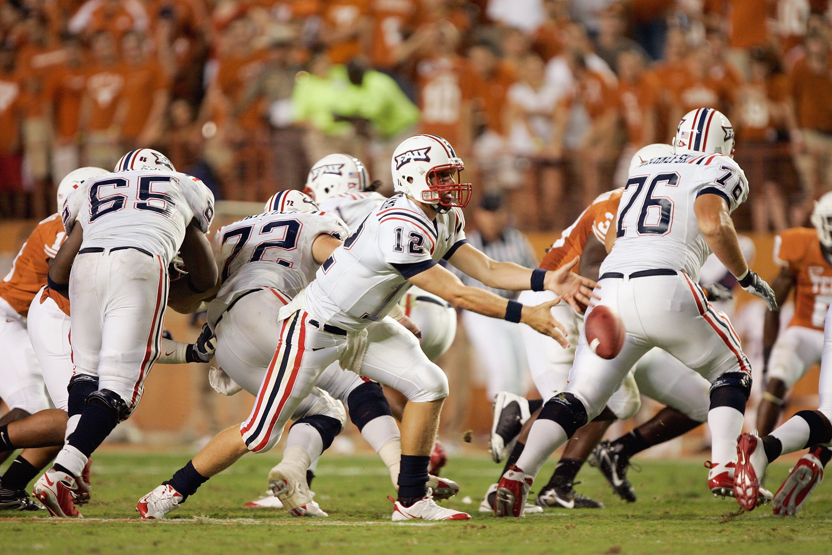 AUSTIN, TX - AUGUST 30:  Quarterback  Jeff VanCamp #12 of the Florida Atlantic Owls pitches the ball during the game against the Texas Longhorns on August 30, 2007 at Darrell K Royal-Texas Memorial Stadium in Austin, Texas.  Texas won 52-10. (Photo by Bri