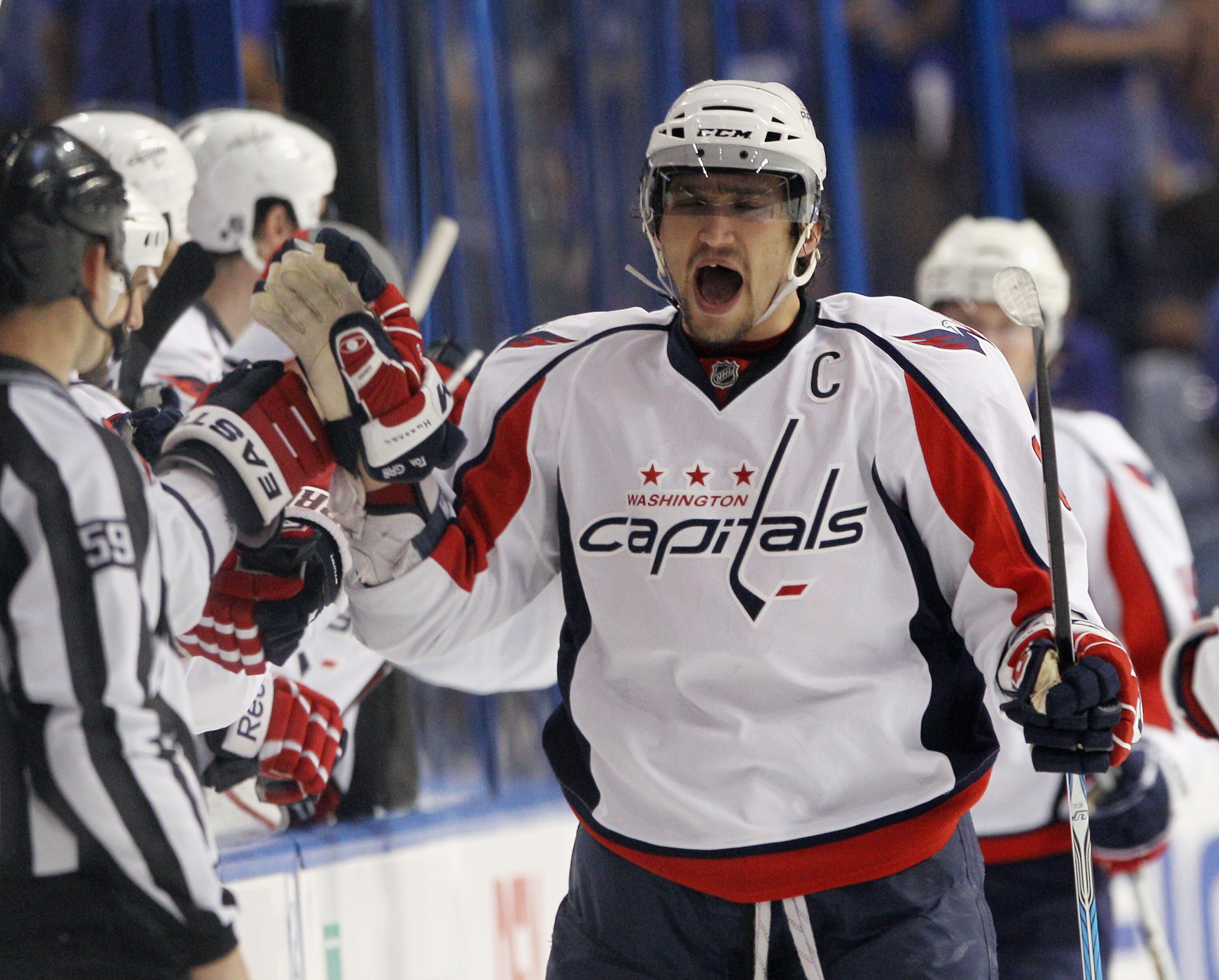 TAMPA, FL - MAY 03:  Alex Ovechkin #8 of the Washington Capitals celebrates a goal by Mike Knuble #22 (not shown) at 59 seconds of the second period against the Tampa Bay Lightning in Game Three of the Eastern Conference Semifinals during the 2011 NHL Sta