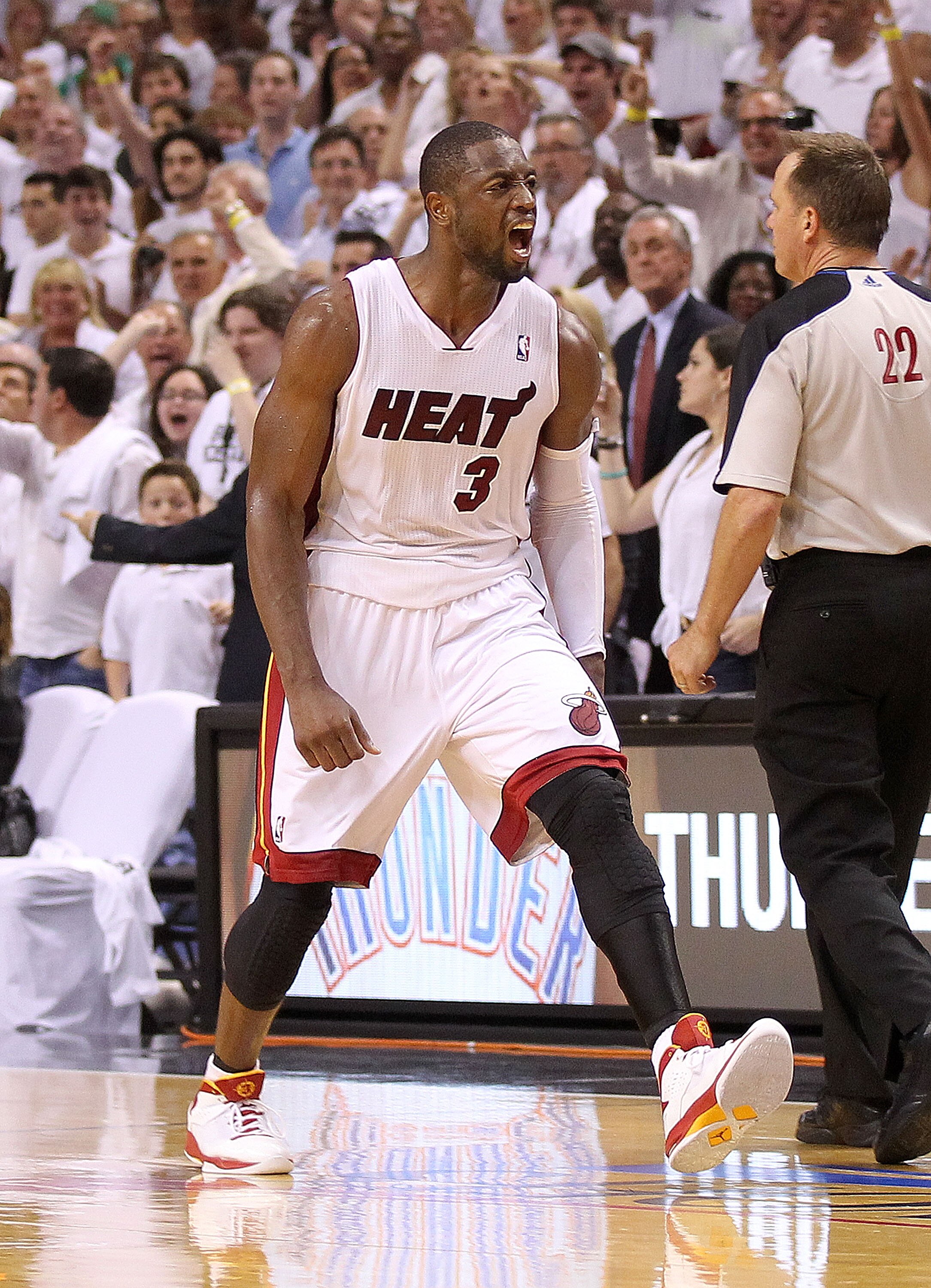 MIAMI, FL - MAY 11:  Dwyane Wade #3 of the Miami Heat reacts after taking the lead during Game Five of the Eastern Conference Semifinals of the 2011 NBA Playoffs against the Boston Celtics at American Airlines Arena on May 11, 2011 in Miami, Florida. NOTE