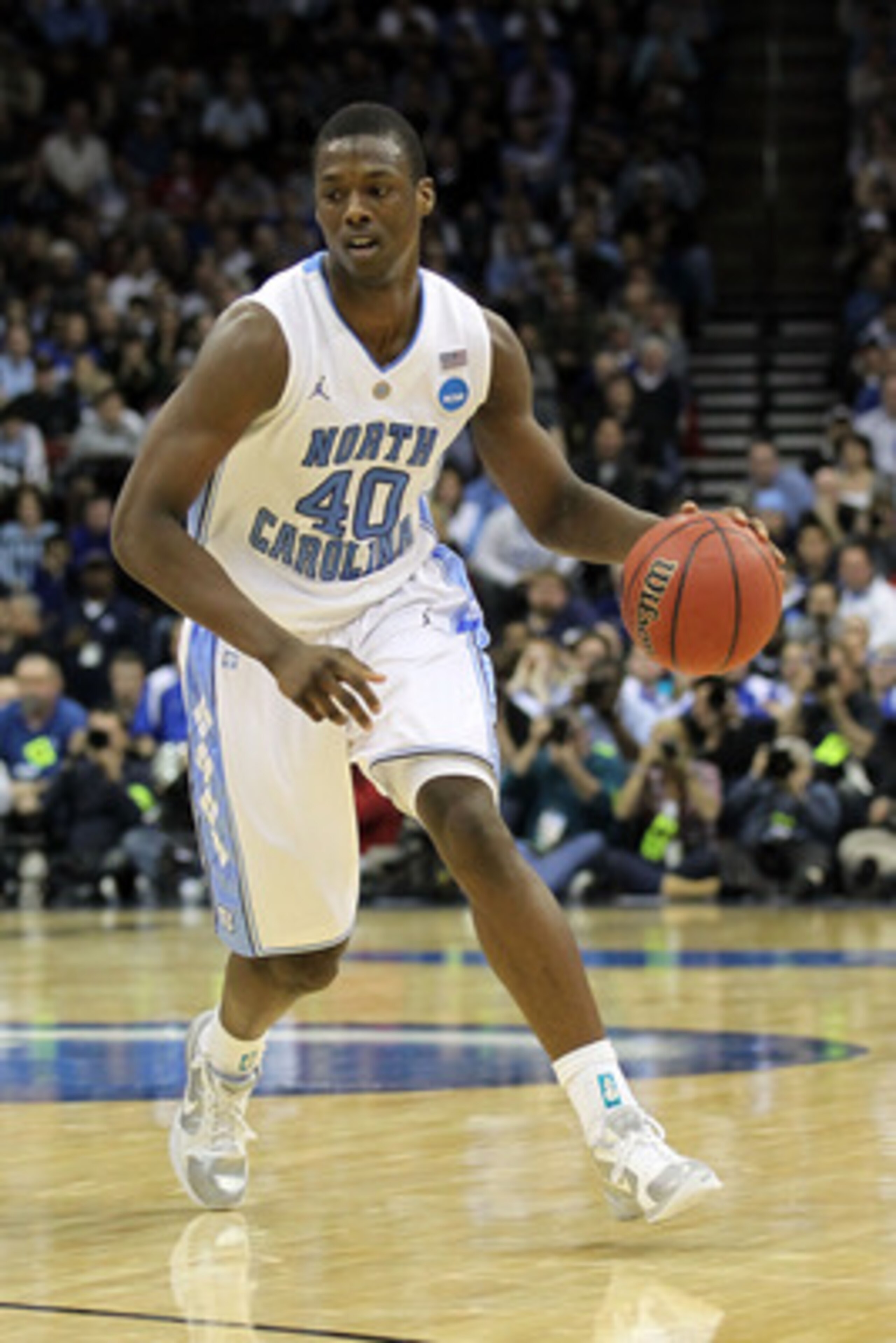 NEWARK, NJ - MARCH 27: Harrison Barnes #40 of the North Carolina Tar Heels dribbles the ball during the second half of the game against the Kentucky Wildcats in the east regional final of the 2011 NCAA men's basketball tournament at Prudential Center on NEWARK, NJ - MARCH 27: Harrison Barnes #40 of the North Carolina Tar Heels dribbles the ball during the second half of the game against the Kentucky Wildcats in the east regional final of the 2011 NCAA men's basketball tournament at Prudential Center on
