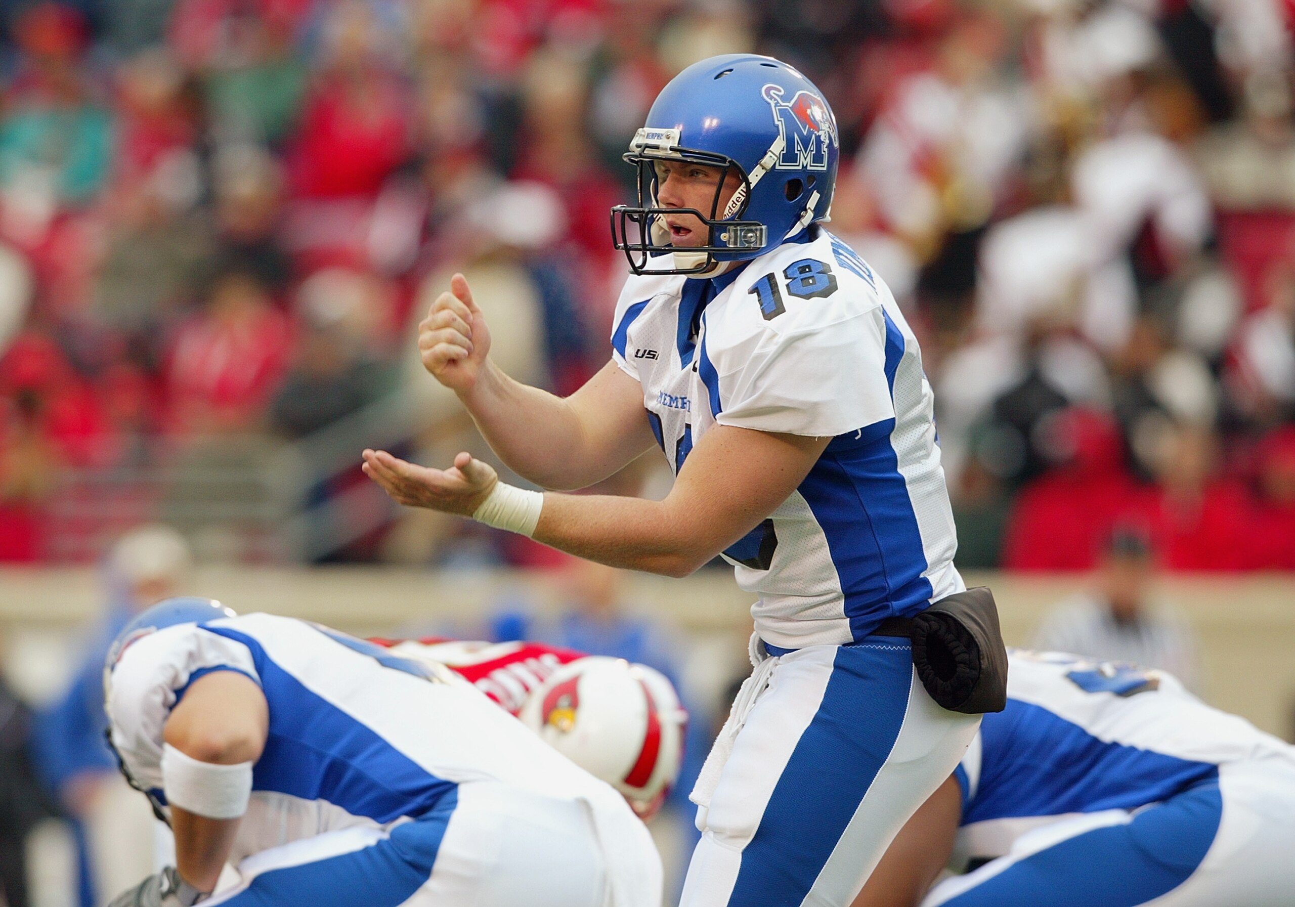 LOUISVILLE, KENTUCKY - NOVEMBER 15:  Quarterback Danny Wimprine #18 of the Memphis Tigers waits to receive the snap of the ball during the game against the Louisville Cardinals on November15, 2003 at Papa John's Stadium in Louisville, Kentucky. The Tigers