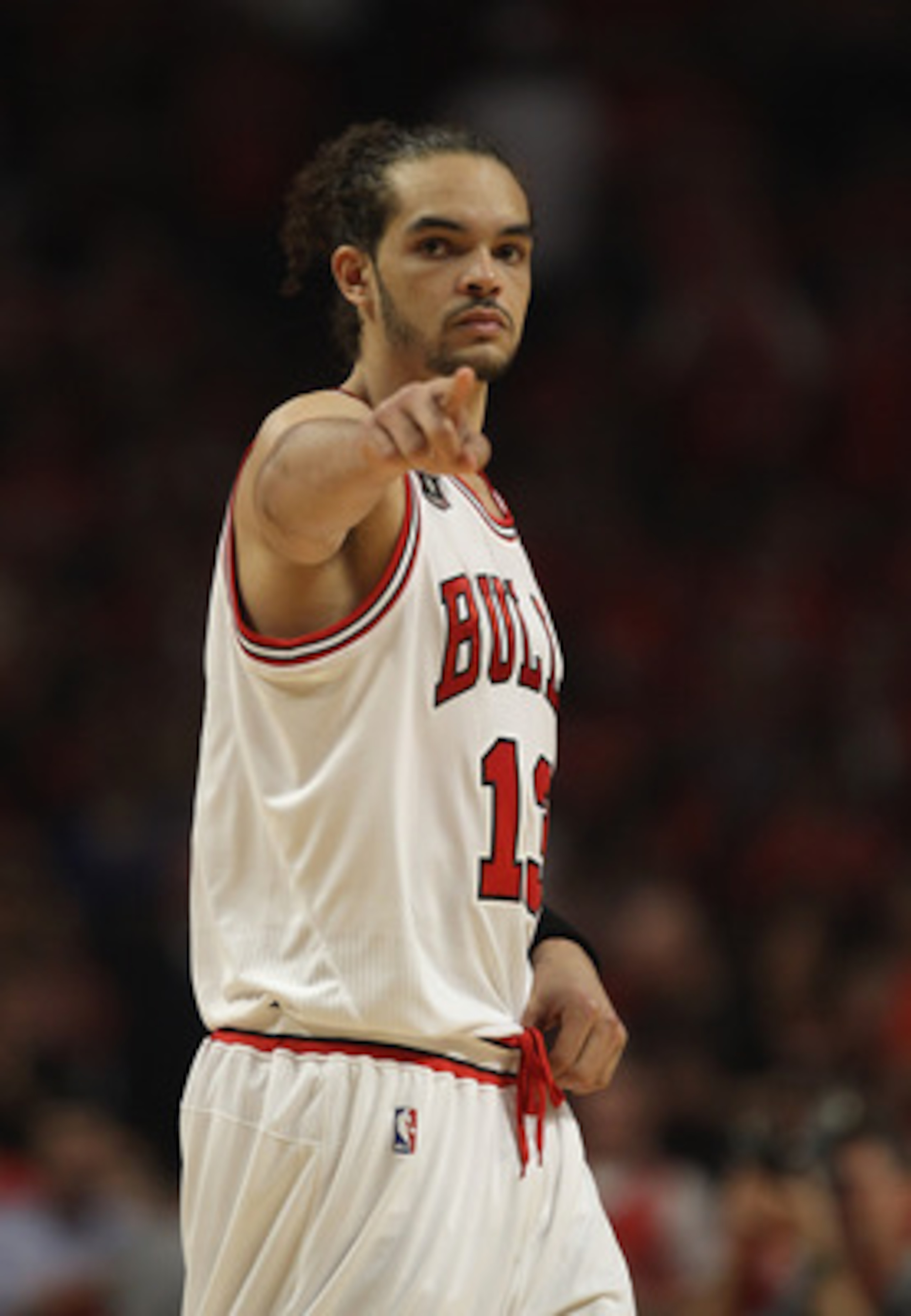 CHICAGO, IL - MAY 10: Joakim Noah #13 of the Chicago Bulls points to family in the stands before taking on Atlanta Hawks in Game Five of the Eastern Conference Semifinals in the 2011 NBA Playoffs at the United Center on May 10, 2011 in Chicago, Illinois. 
