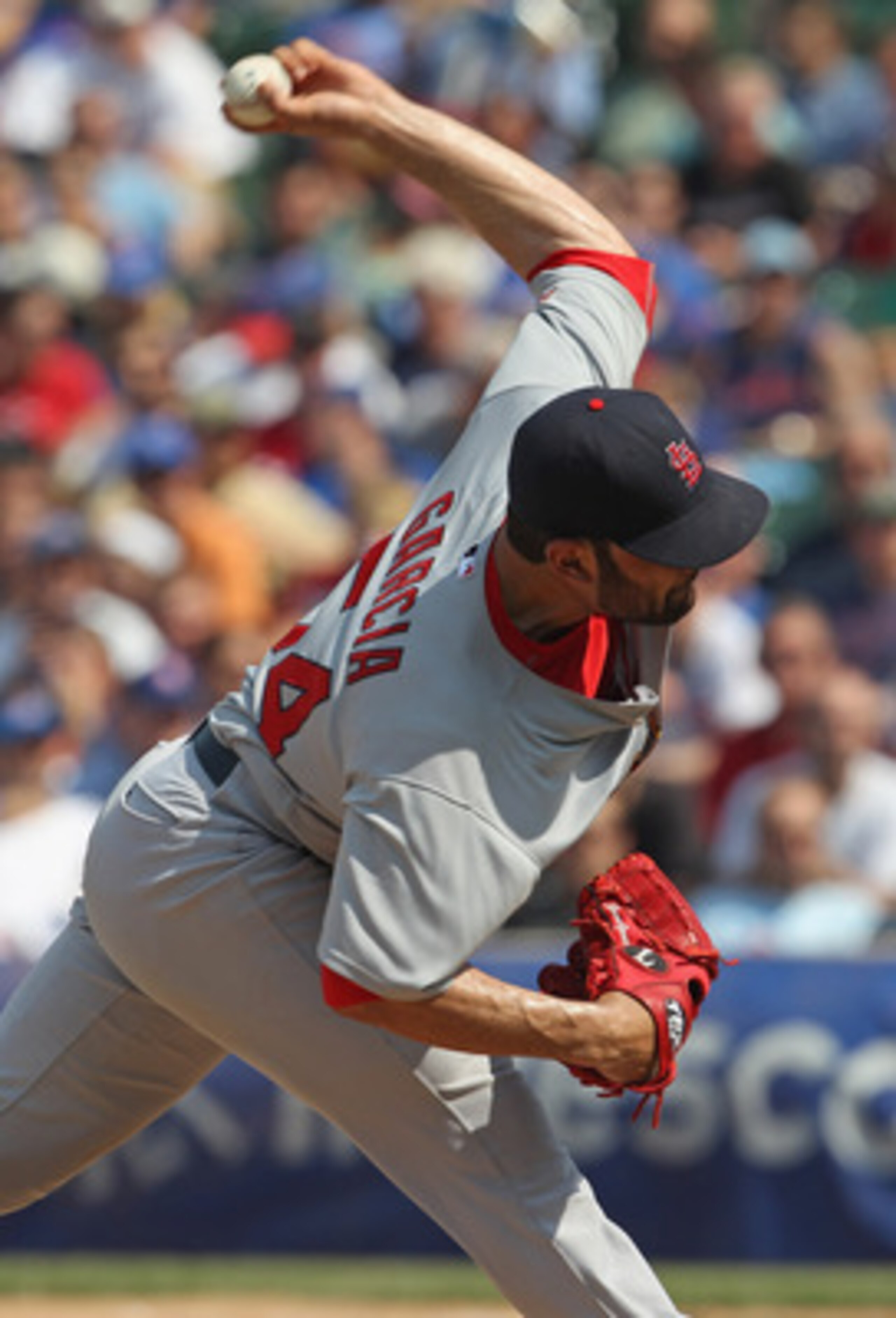 CHICAGO, IL - MAY 12: Starting pitcher Jamie Garcia #54 of the St. Louis Cardinals delivers the ball against the Chicago Cubs on his way to a 5-0 record at Wrigley Field on May 12, 2011 in Chicago, Illinois. The Cardinals defeated the Cubs 9-1. (Photo by 