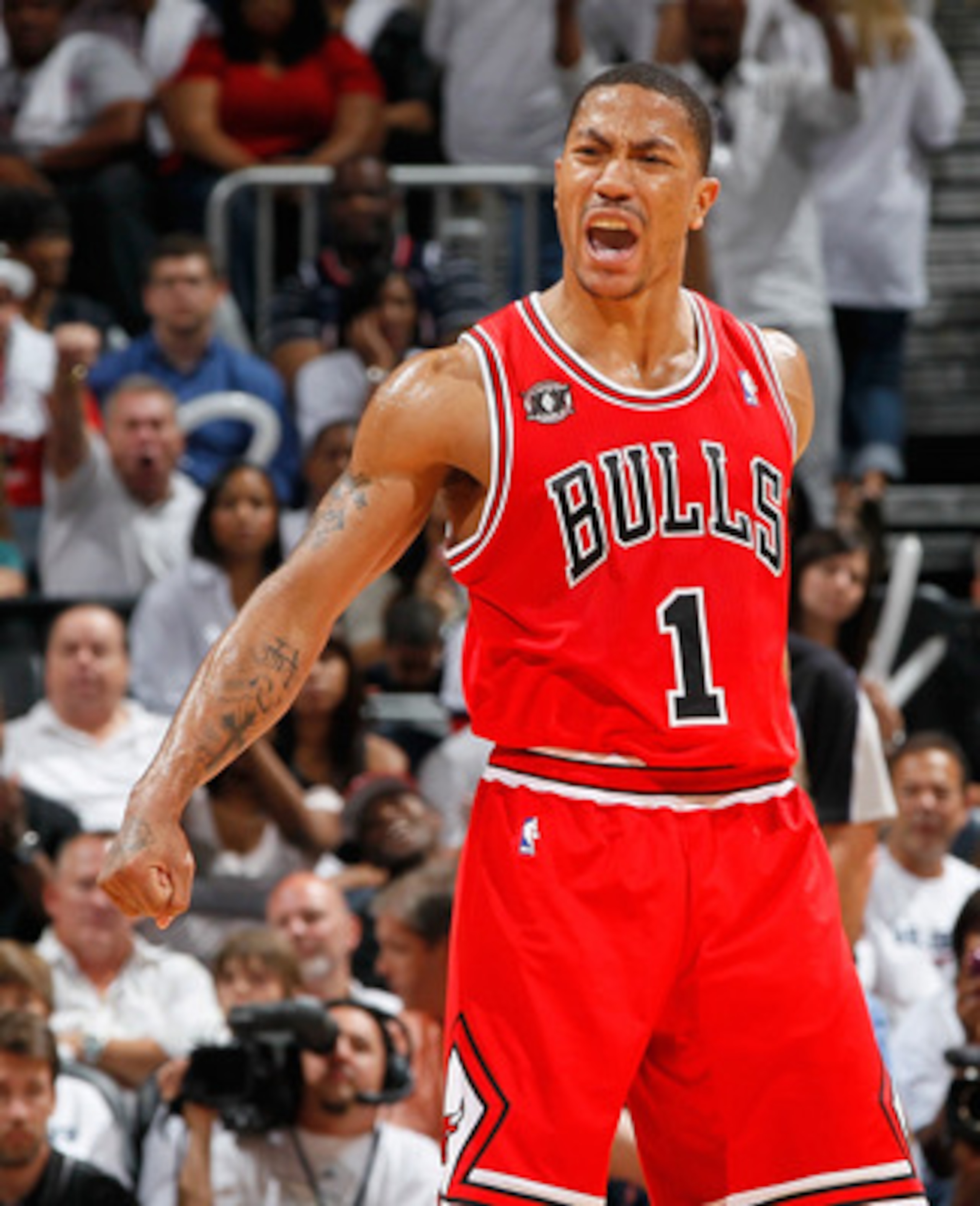 ATLANTA, GA - MAY 12:  Derrick Rose #1 of the Chicago Bulls reacts after a basket against the Atlanta Hawks in Game Six of the Eastern Conference Semifinals in the 2011 NBA Playoffs at Phillips Arena on May 12, 2011 in Atlanta, Georgia.  NOTE TO USER: Use
