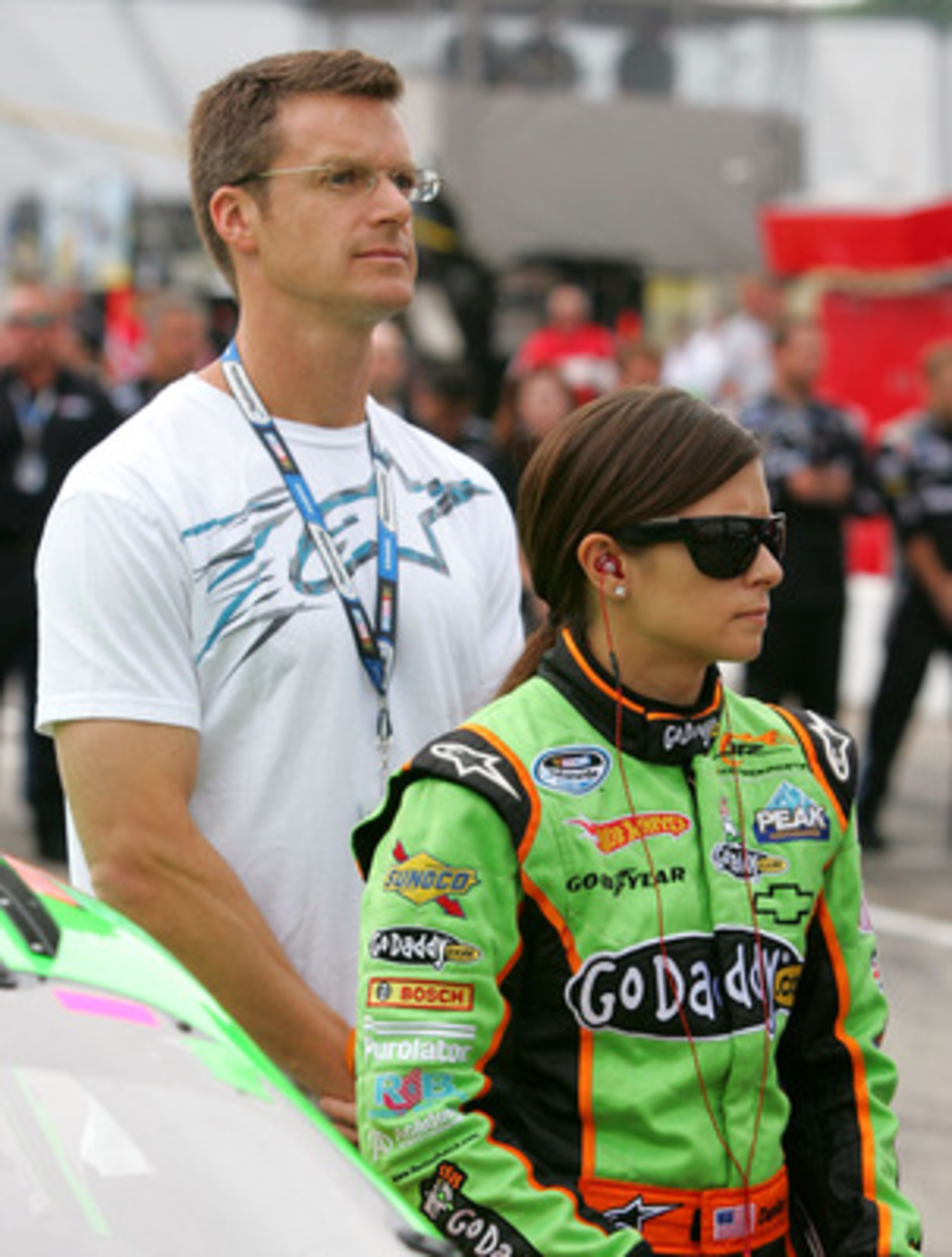 LOUDON, NH - JUNE 26: Danica Patrick (R), driver of the #7 GoDaddy.com Chevrolet, stands on pit road with her husband Paul Hospenthal (L) during pre-race for the NASCAR Nationwide Series New England 200 at New Hampshire Motor Speedway on June 26, 2010 in LOUDON, NH - JUNE 26: Danica Patrick (R), driver of the #7 GoDaddy.com Chevrolet, stands on pit road with her husband Paul Hospenthal (L) during pre-race for the NASCAR Nationwide Series New England 200 at New Hampshire Motor Speedway on June 26, 2010 in