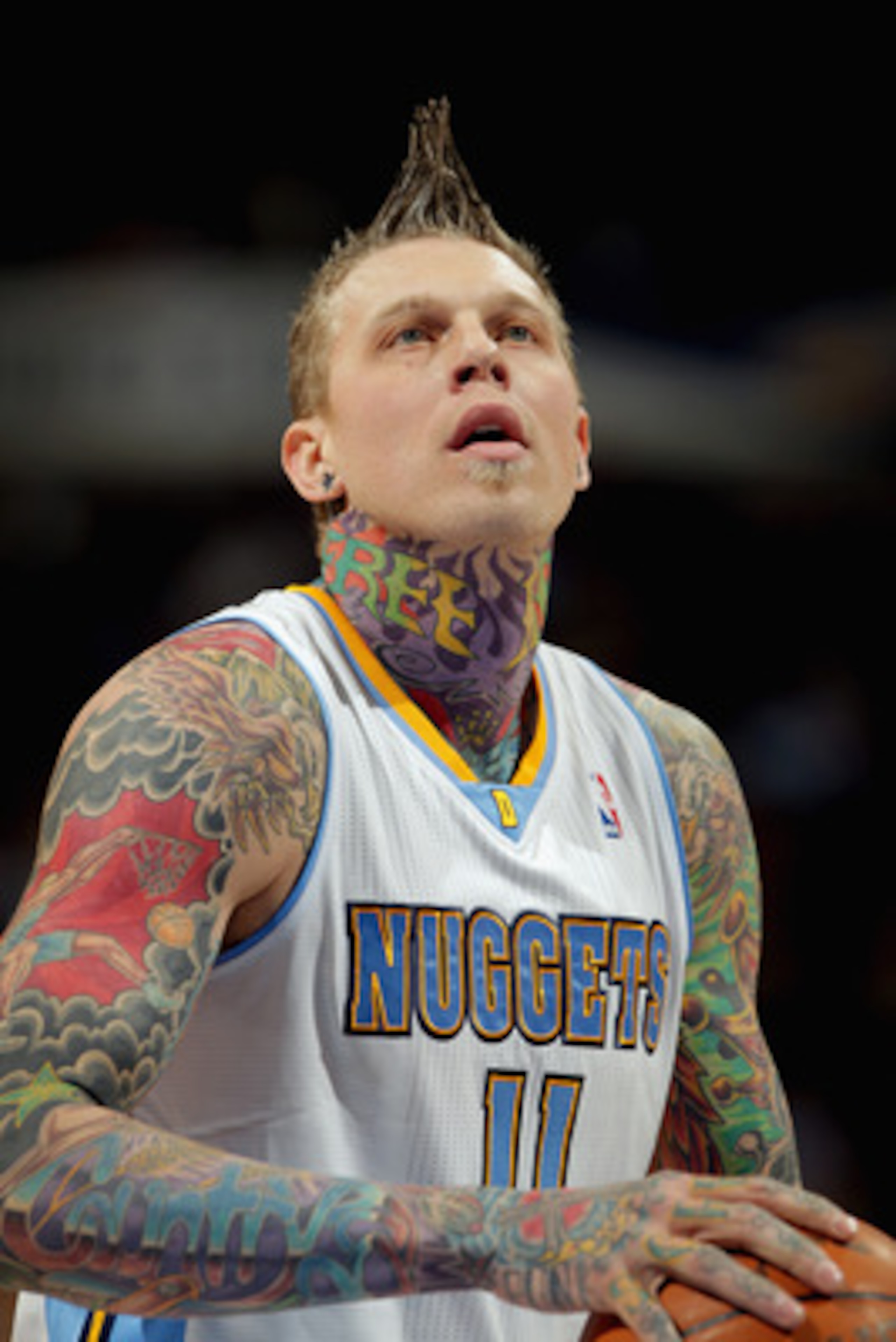 DENVER, CO - MARCH 21:  Chris Andersen #11 of the Denver Nuggets takes a free throw against the Toronto Raptors at the Pepsi Center on March 21, 2011 in Denver, Colorado. The Nuggets defeated the Raptors 123-90. NOTE TO USER: User expressly acknowledges a