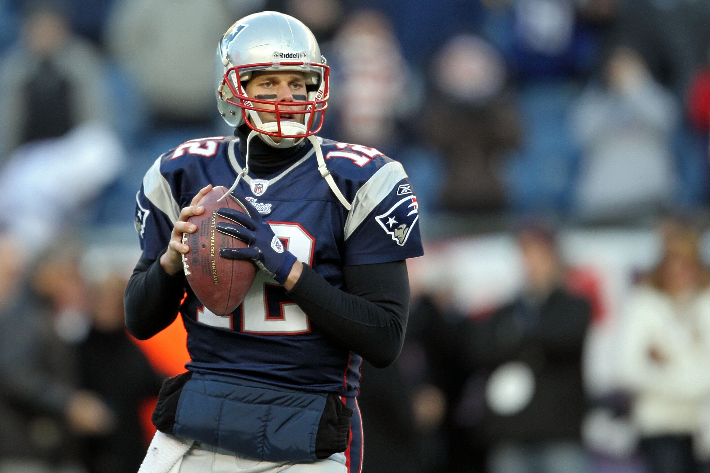 FOXBORO, MA - JANUARY 16:  Tom Brady #12 of the New England Patriots warms up prior to their game against the New York Jets during their 2011 AFC divisional playoff game at Gillette Stadium on January 16, 2011 in Foxboro, Massachusetts.  (Photo by Jim Rog