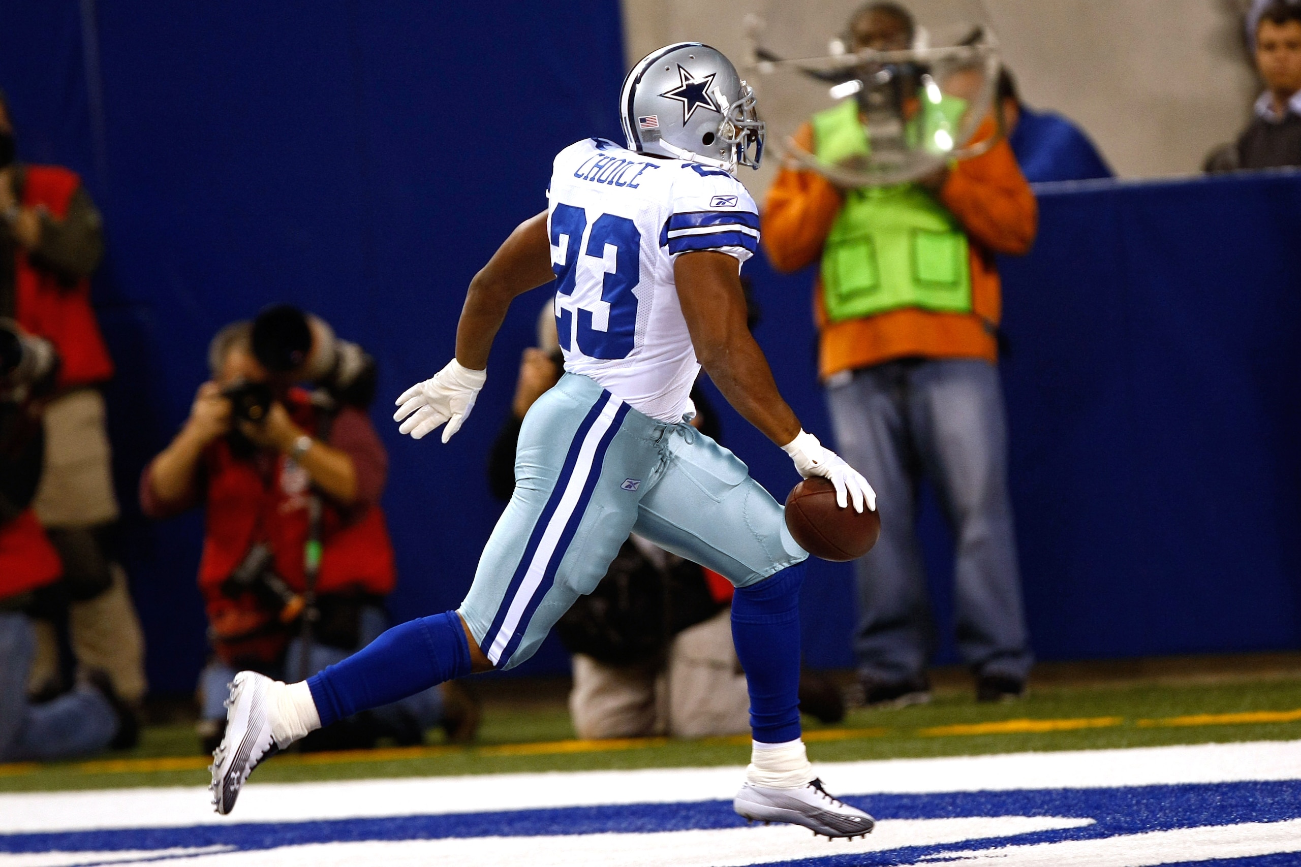 INDIANAPOLIS, IN - DECEMBER 05: Tashard Choice #23 of the Dallas Cowboys runs in the end zone for a touchdown in the 1st quarter against the Indianapolis Colts at Lucas Oil Stadium on December 5, 2010 in Indianapolis, Indiana.  (Photo by Scott Boehm/Getty