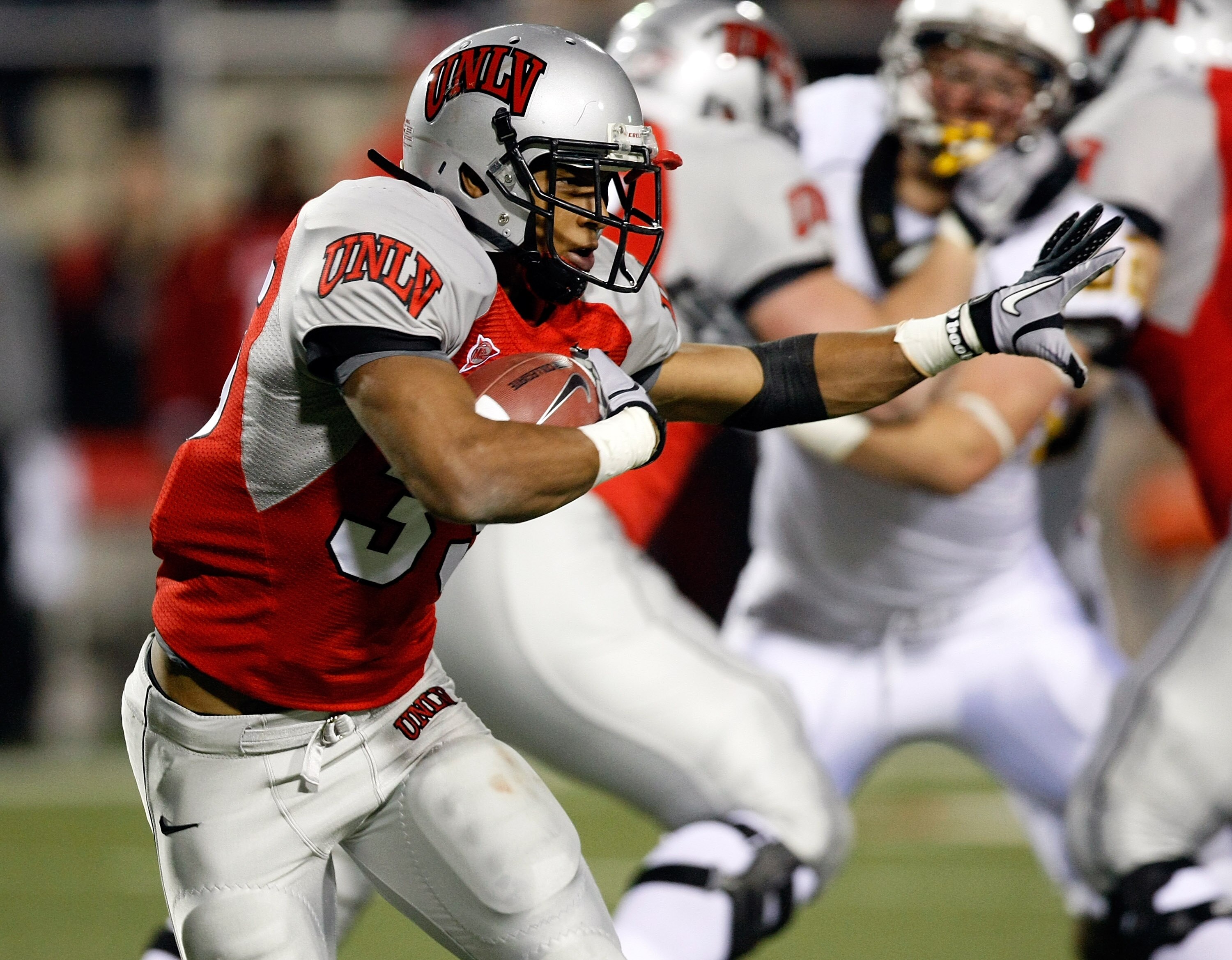 LAS VEGAS - NOVEMBER 13:  Tim Cornett #35 of the UNLV Rebels runs for yardage against the Wyoming Cowboys during their game at Sam Boyd Stadium November 13, 2010 in Las Vegas, Nevada. Cornett had four touchdowns in UNLV's 42-16 victory. (Photo by Ethan Mi