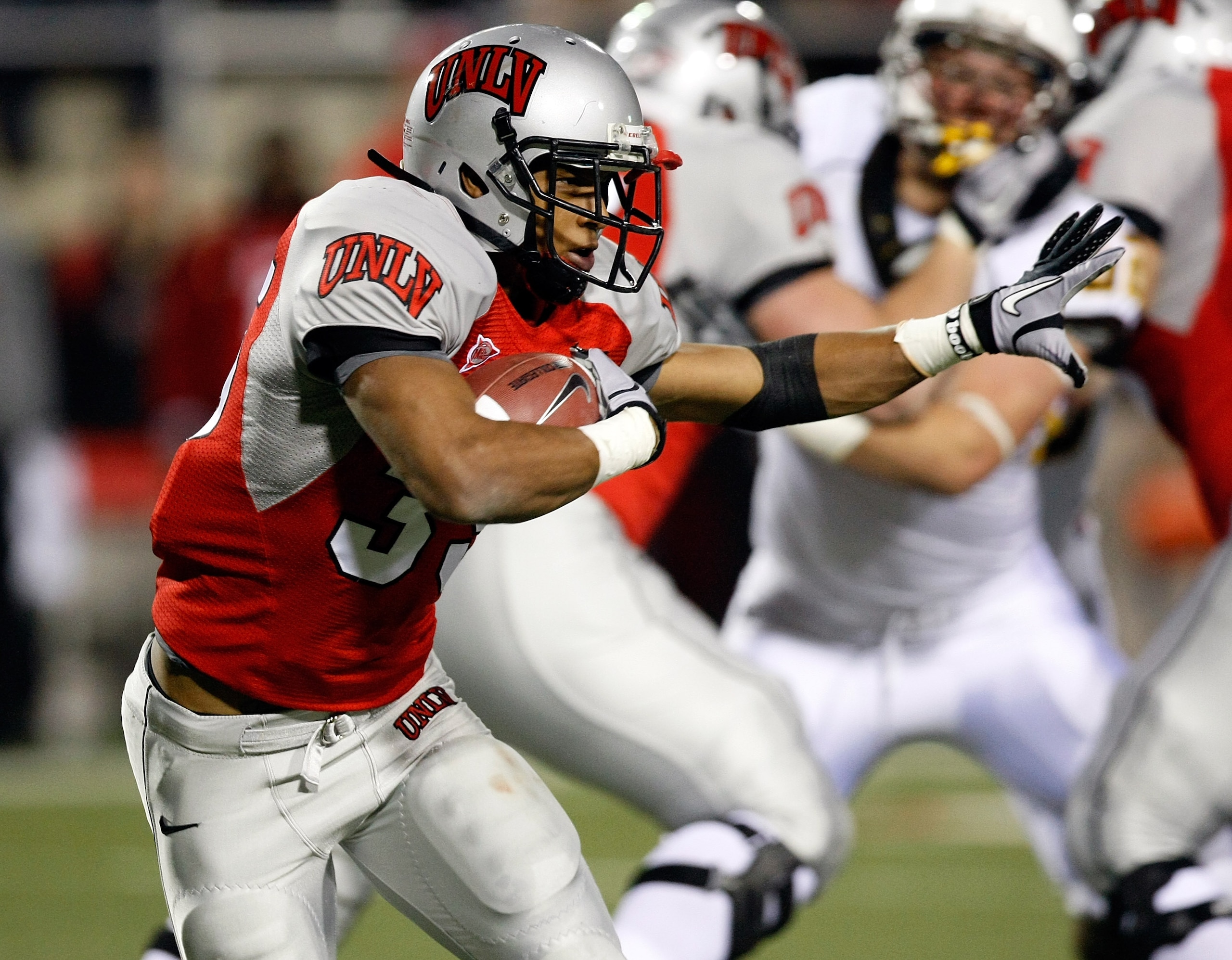 LAS VEGAS - NOVEMBER 13:  Tim Cornett #35 of the UNLV Rebels runs for yardage against the Wyoming Cowboys during their game at Sam Boyd Stadium November 13, 2010 in Las Vegas, Nevada. Cornett had four touchdowns in UNLV's 42-16 victory. (Photo by Ethan Mi