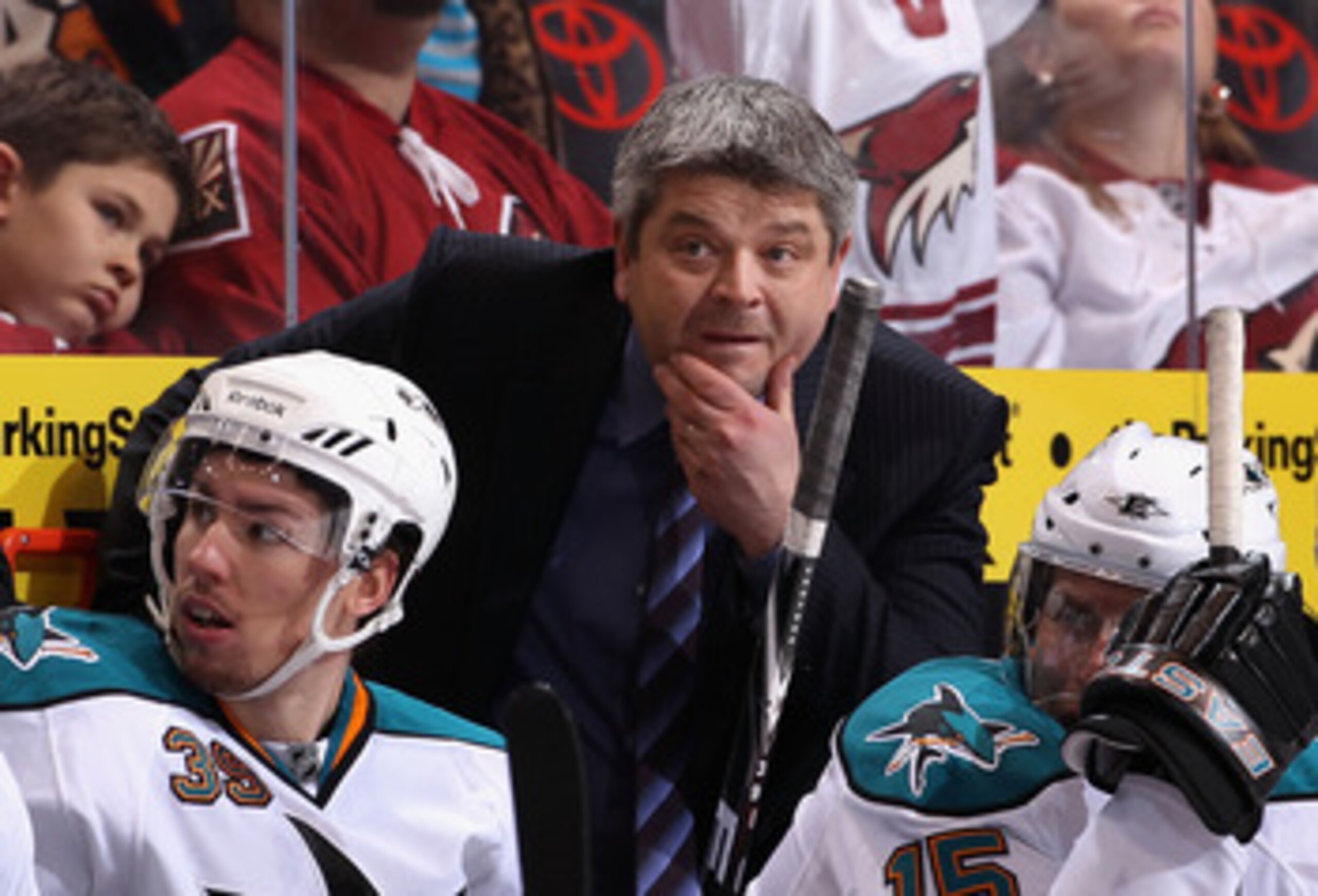 GLENDALE, AZ - JANUARY 17:  Head coach Todd McLellan of the San Jose Sharks watches from the bench during the NHL game against the Phoenix Coyotes at Jobing.com Arena on January 17, 2011 in Glendale, Arizona.  The Sharks defeated the Coyotes 4-2. (Photo b