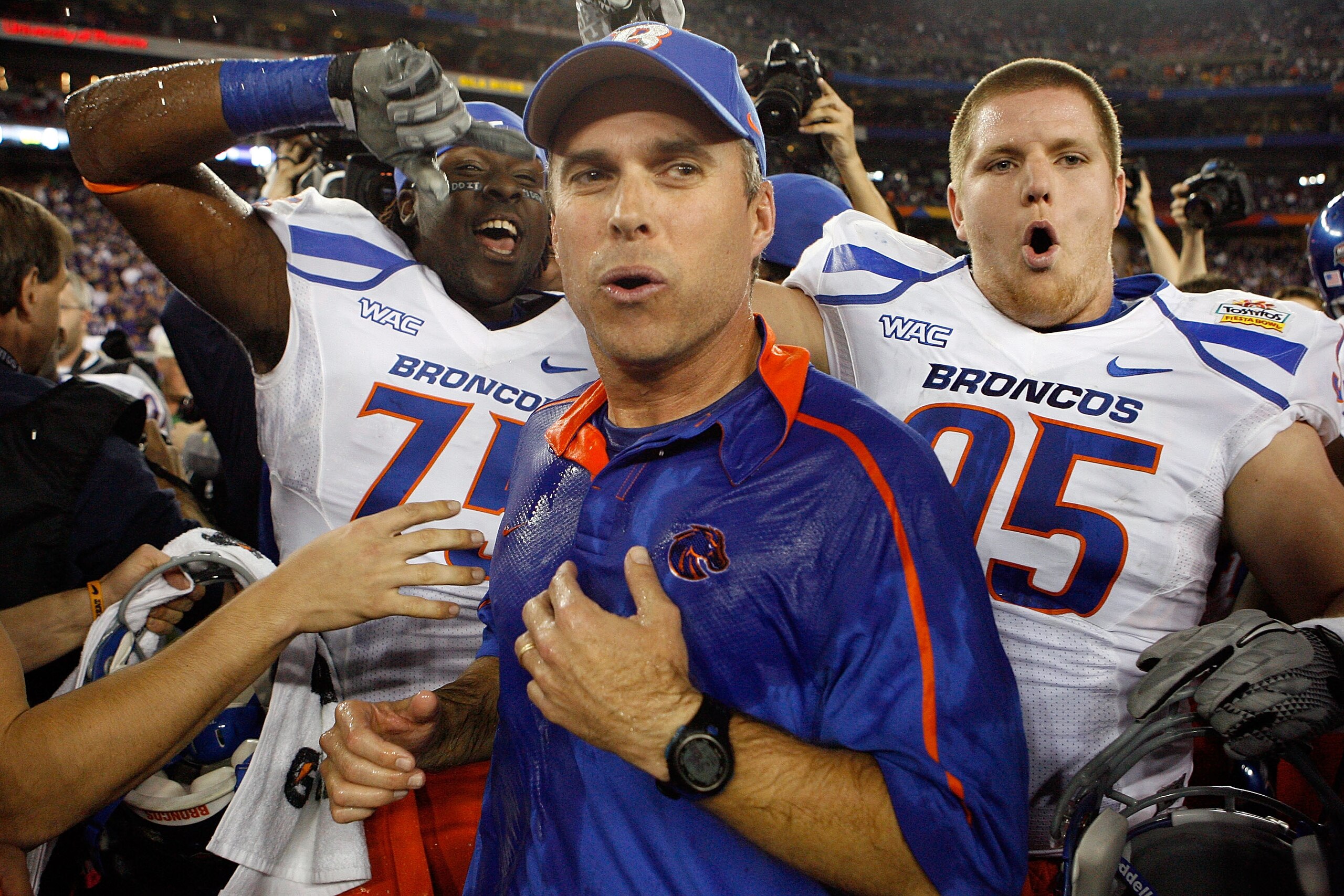 GLENDALE, AZ - JANUARY 04:  Head coach Chris Petersen of the Boise State Broncos celebrates after defeating the TCU Horned Frogs 17-10 during the Tostitos Fiesta Bowl at the Universtity of Phoenix Stadium on January 4, 2010 in Glendale, Arizona.  (Photo b