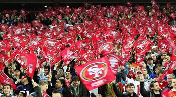 LONDON, ENGLAND - OCTOBER 31:  San Francisco 49ers fans waves flags in support of their team during the NFL International Series match between Denver Broncos and San Francisco 49ers at Wembley Stadium on October 31, 2010 in London, England. This is the fo
