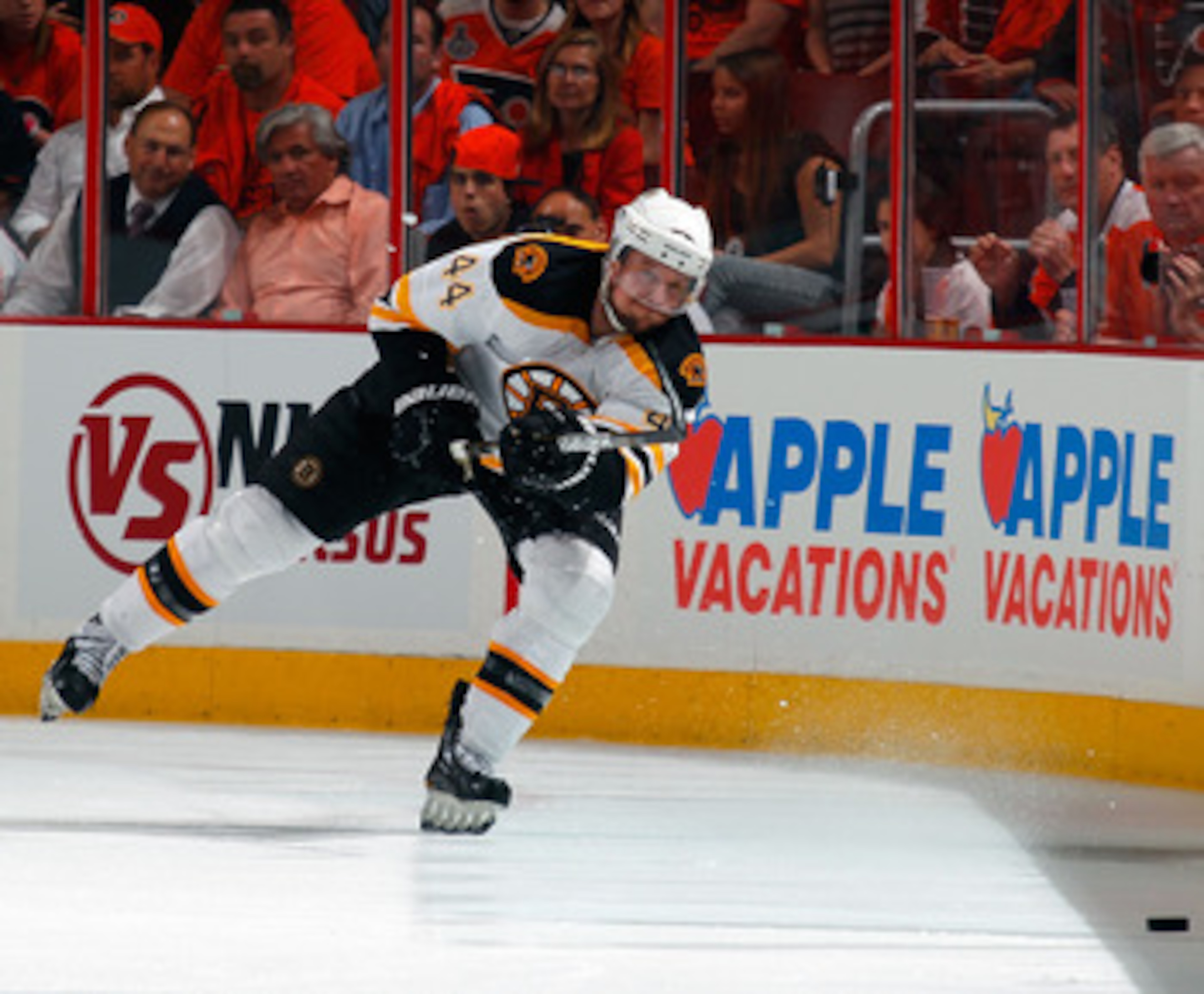 PHILADELPHIA, PA - MAY 02:  Dennis Seidenberg #44 of the Boston Bruins clears the puck during Game Two of the Eastern Conference Semifinals against the Philadelphia Flyers during the 2011 NHL Stanley Cup Playoffs at Wells Fargo Center on May 2, 2011 in Ph