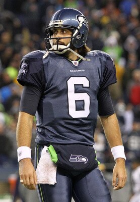 SEATTLE, WA - JANUARY 02: Quarterback Charlie Whitehurst #6 of the Seattle Seahawks stands on the field during their game against the St. Louis Rams at Qwest Field on January 2, 2011 in Seattle, Washington. (Photo by Otto Greule Jr/Getty Images) SEATTLE, WA - JANUARY 02: Quarterback Charlie Whitehurst #6 of the Seattle Seahawks stands on the field during their game against the St. Louis Rams at Qwest Field on January 2, 2011 in Seattle, Washington. (Photo by Otto Greule Jr/Getty Images)