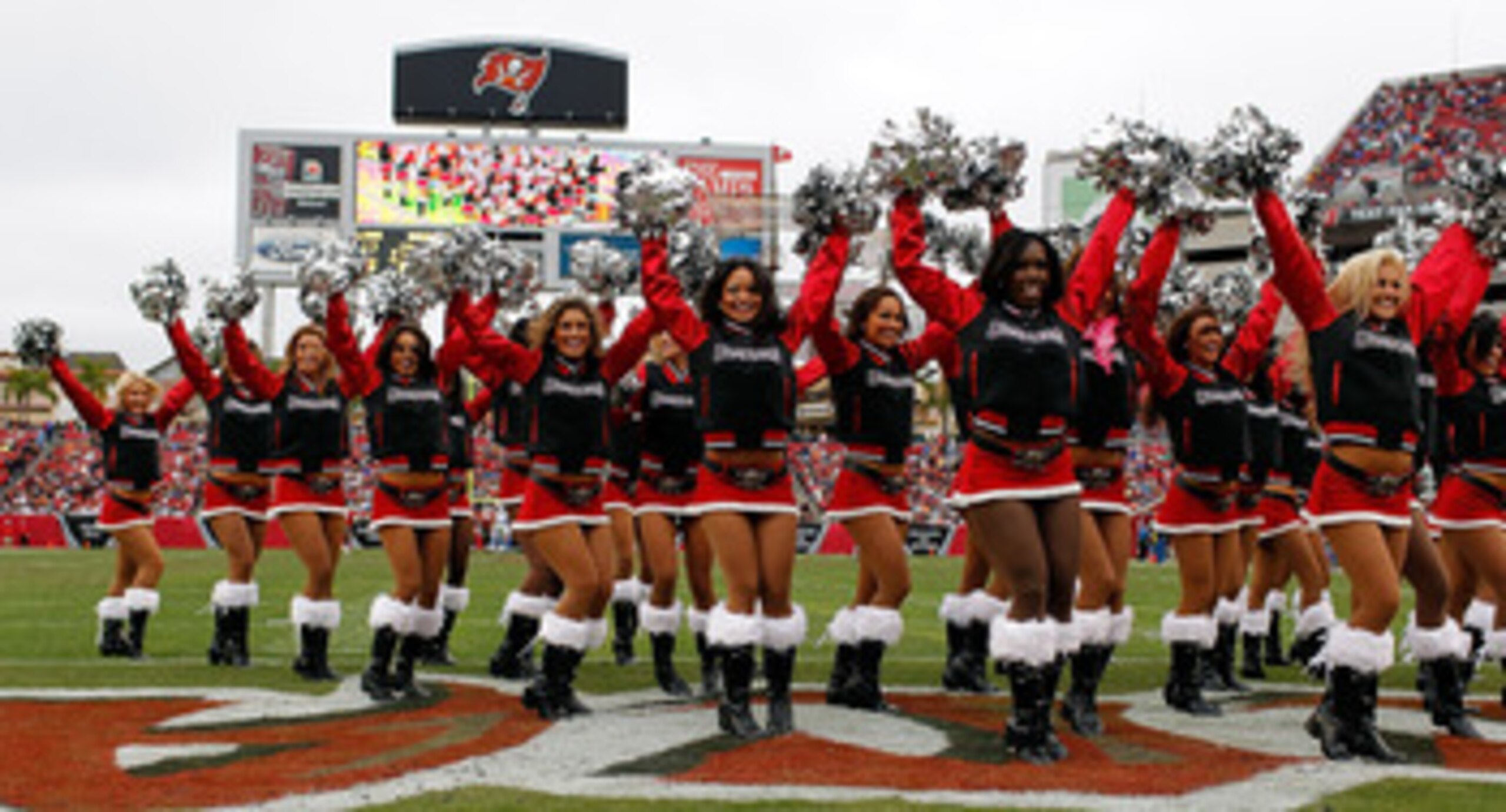 TAMPA, FL - DECEMBER 19:  Cheerleaders of the Tampa Bay Buccaneers perform during the game against the Detroit Lions at Raymond James Stadium on December 19, 2010 in Tampa, Florida.  (Photo by J. Meric/Getty Images)