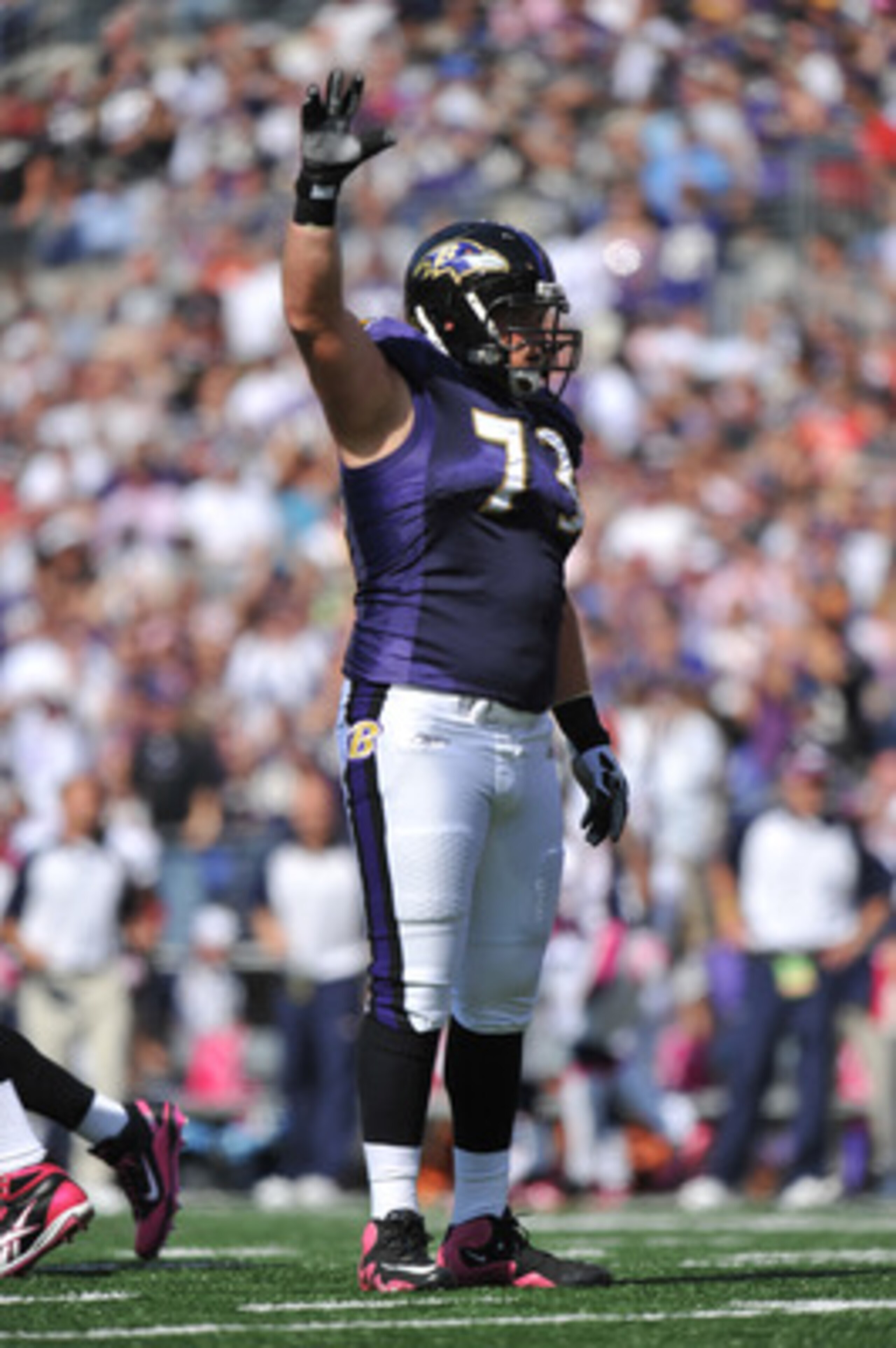 BALTIMORE, MD - OCTOBER 10: Marshal Yanda #73 of the Baltimore Ravens waves to the crowd during the game against the Denver Broncos at M&T Bank Stadium on October 10, 2010 in Baltimore, Maryland. Players wore pink in recognition of Breast Cancer Awareness BALTIMORE, MD - OCTOBER 10: Marshal Yanda #73 of the Baltimore Ravens waves to the crowd during the game against the Denver Broncos at M&T Bank Stadium on October 10, 2010 in Baltimore, Maryland. Players wore pink in recognition of Breast Cancer Awareness
