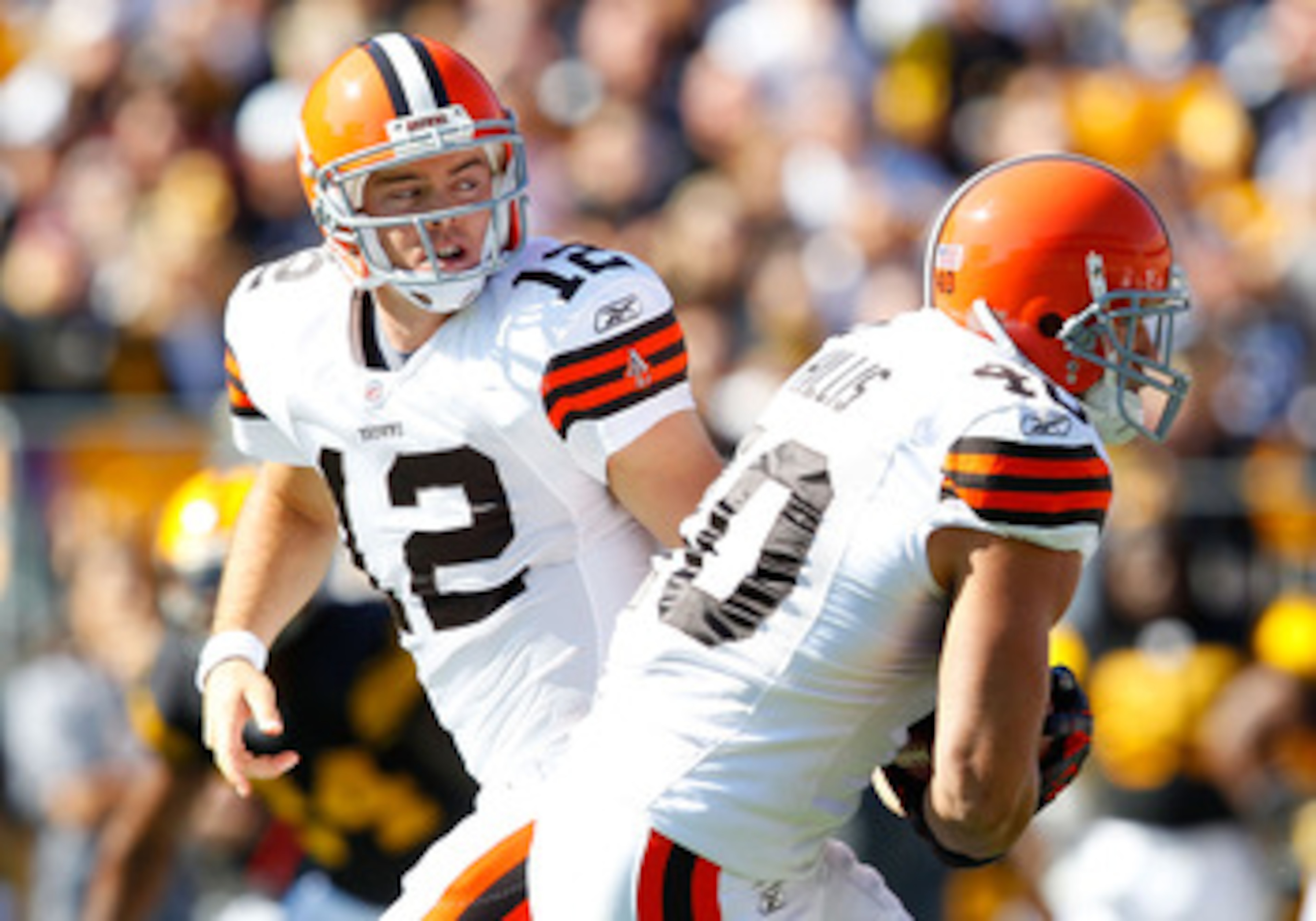 PITTSBURGH - OCTOBER 17:  Colt McCoy #12 of the Cleveland Browns hands the ball off to Peyton Hillis #40 during the game against the Pittsburgh Steelers on October 17, 2010 at Heinz Field in Pittsburgh, Pennsylvania.  (Photo by Jared Wickerham/Getty Image