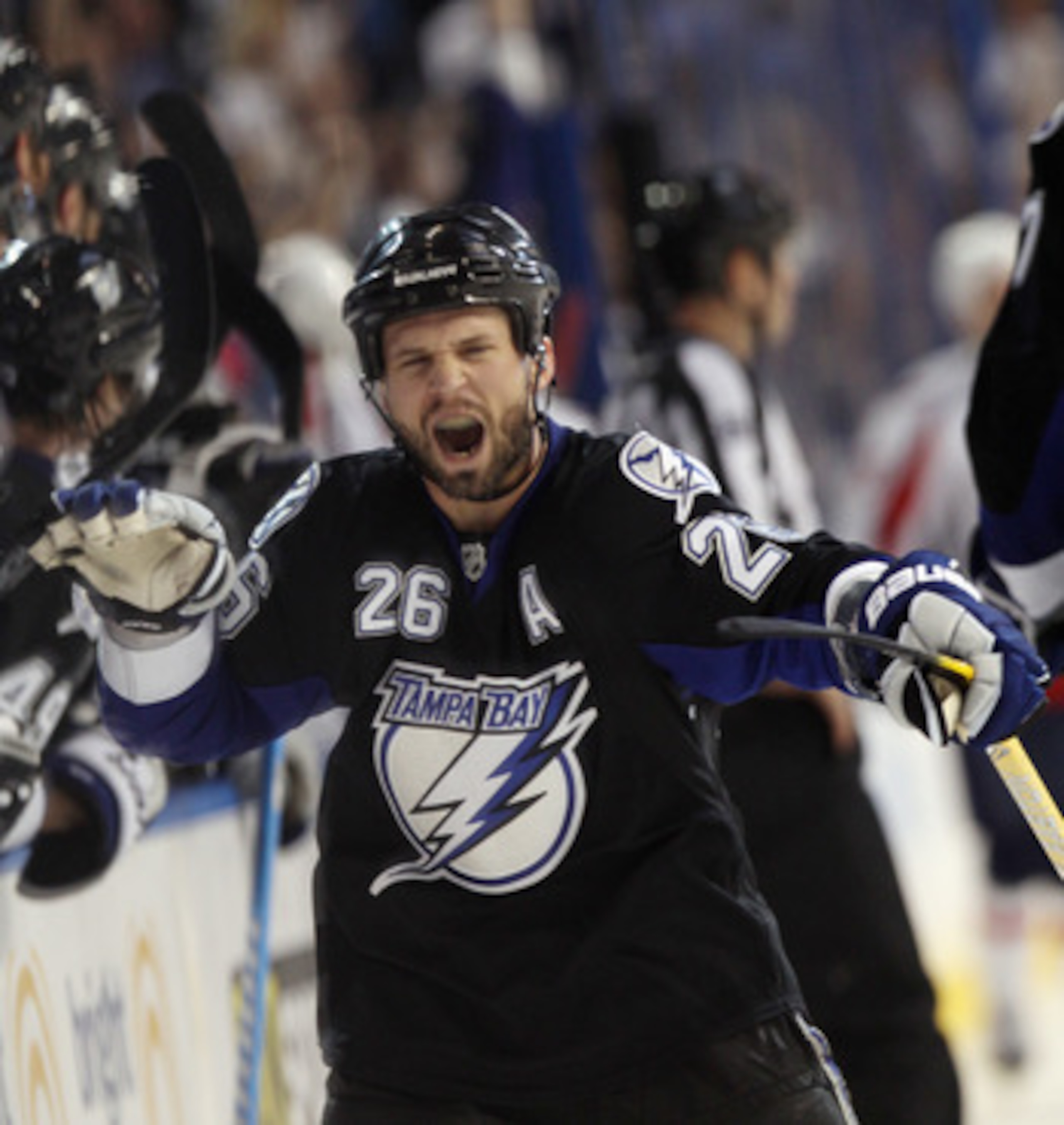 TAMPA, FL - MAY 04:  Martin St. Louis #26 of the Tampa Bay Lightning celebrates his goal at 16:52 of the third period against the Washington Capitals in Game Four of the Eastern Conference Semifinals during the 2011 NHL Stanley Cup Playoffs at the St Pete