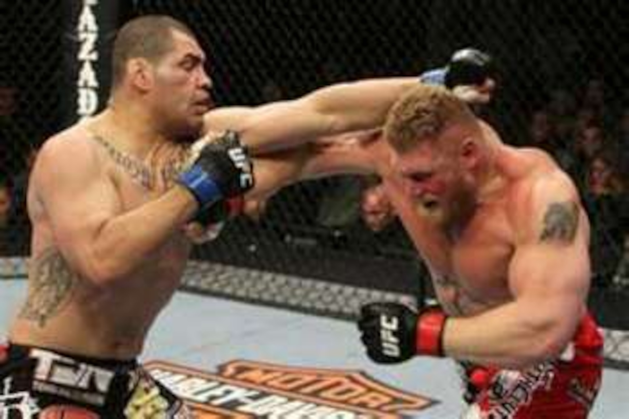 Cain Velasquez engaging with Brock Lesnar