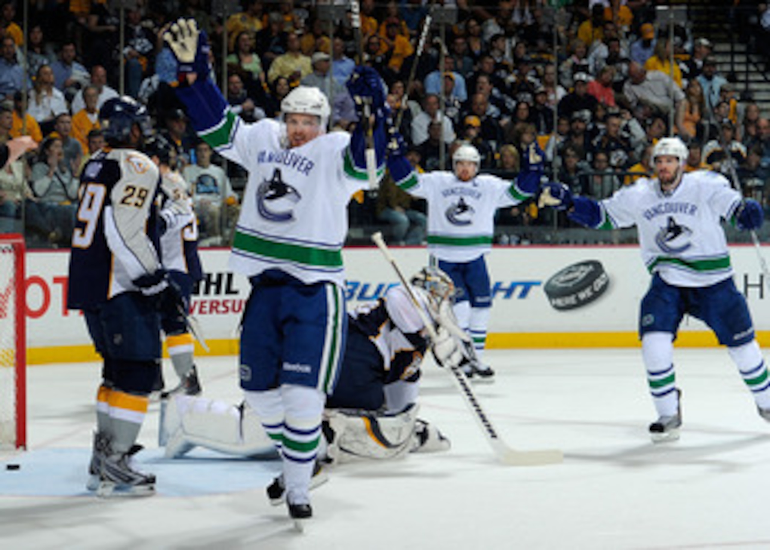 NASHVILLE, TN - MAY 09: Daniel Sedin #22, Henrik Sedin #33, and Ryan Kesler #17of the Vancouver Canucks celebrate after a goal against Pekka Rinne #35 of the Nashville Predators in Game Six of the Western Conference Semifinals at the Bridgestone Arena on NASHVILLE, TN - MAY 09: Daniel Sedin #22, Henrik Sedin #33, and Ryan Kesler #17of the Vancouver Canucks celebrate after a goal against Pekka Rinne #35 of the Nashville Predators in Game Six of the Western Conference Semifinals at the Bridgestone Arena on