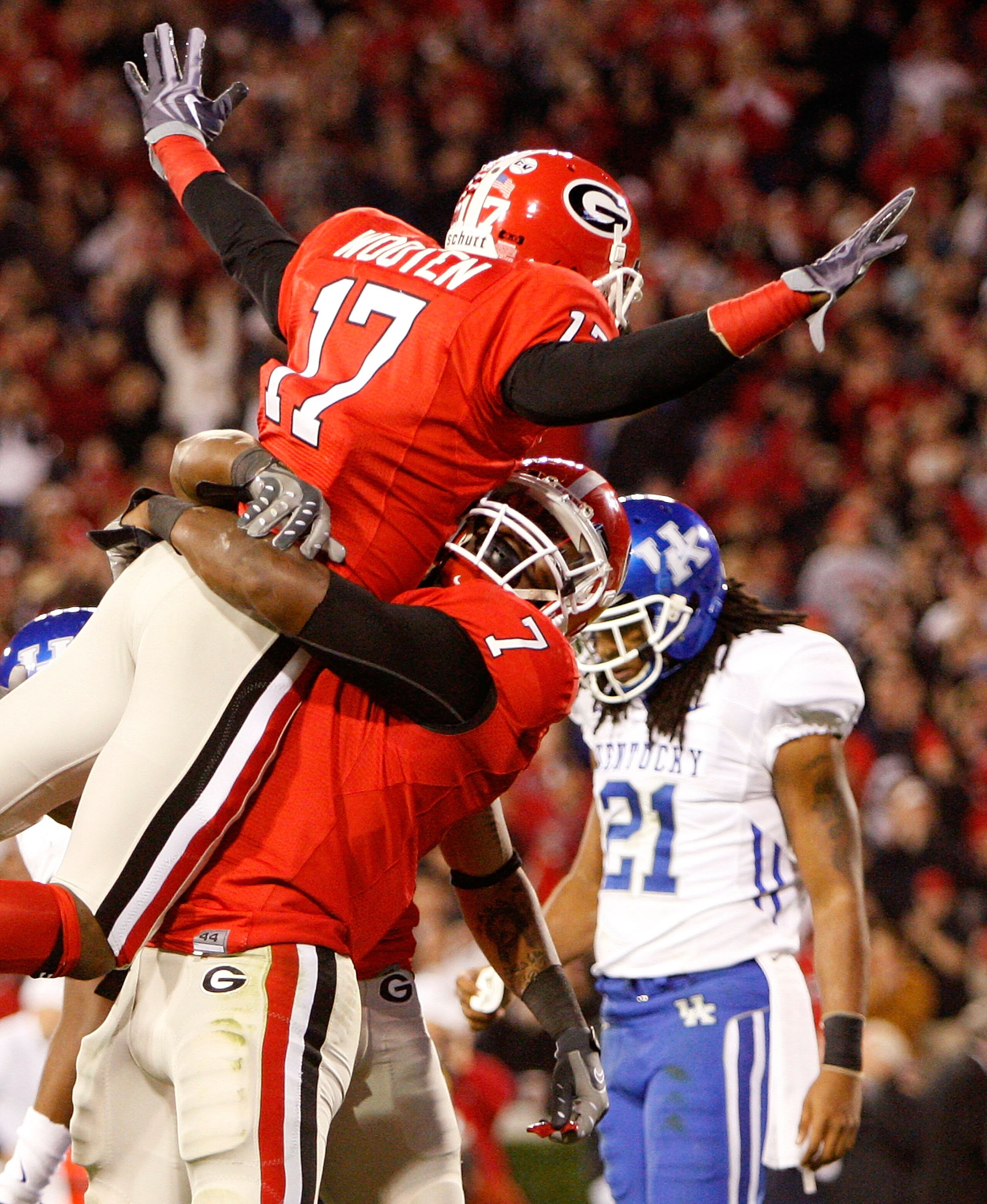 ATHENS, GA - NOVEMBER 21:  Rantavious Wooten #17 of the Georgia Bulldogs celebrates with Orson Charles #7 after scoring a touchdown against the Kentucky Wildcats at Sanford Stadium on November 21, 2009 in Athens, Georgia.  (Photo by Kevin C. Cox/Getty Ima