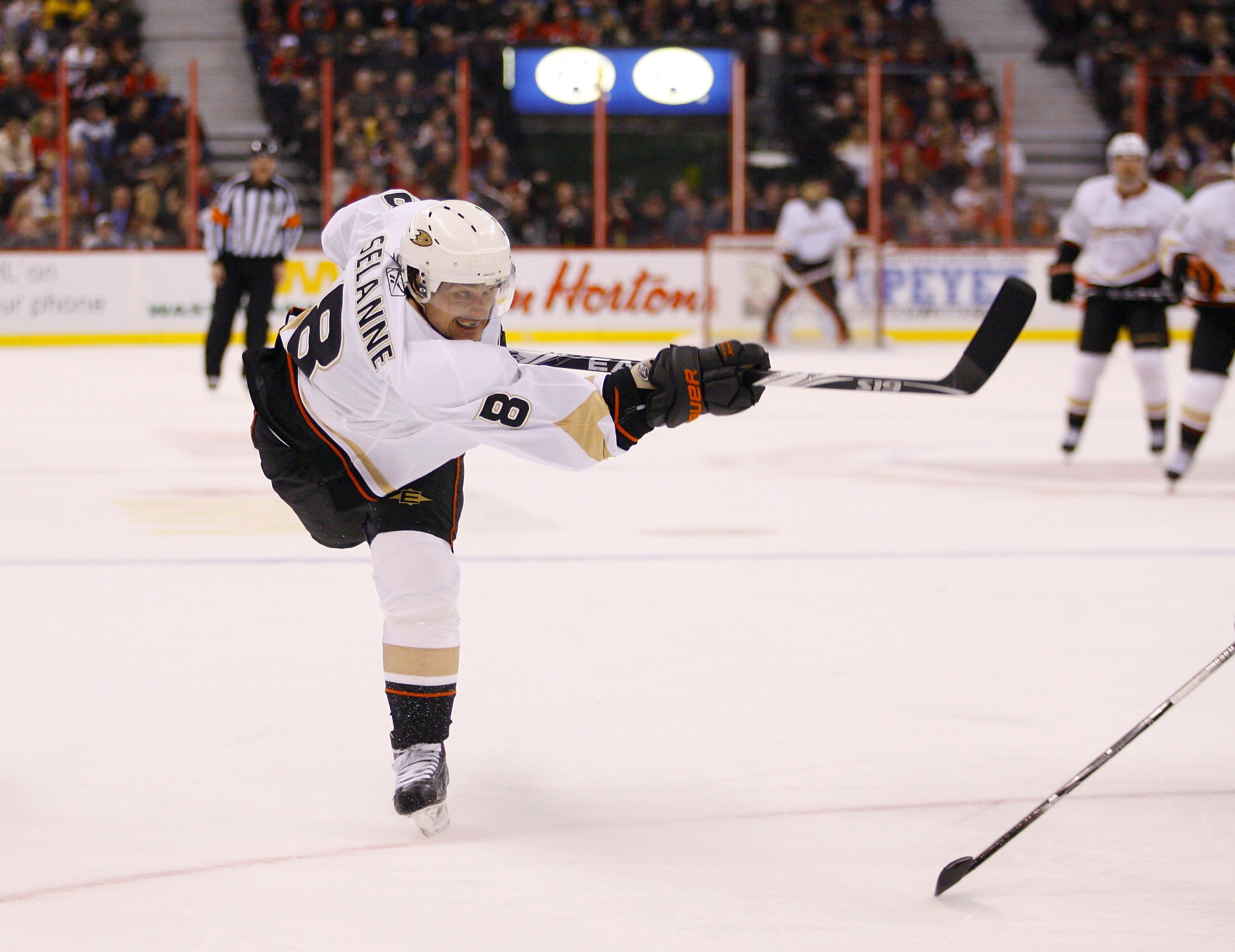 OTTAWA, ON - JANUARY 18:  Teemu Selanne #8 of the Anaheim Ducks fires a hard slapshot off the post in a game against the Ottawa Senators at Scotiabank Place on January 18, 2011 in Ottawa, Canada.  (Photo by Phillip MacCallum/Getty Images)
