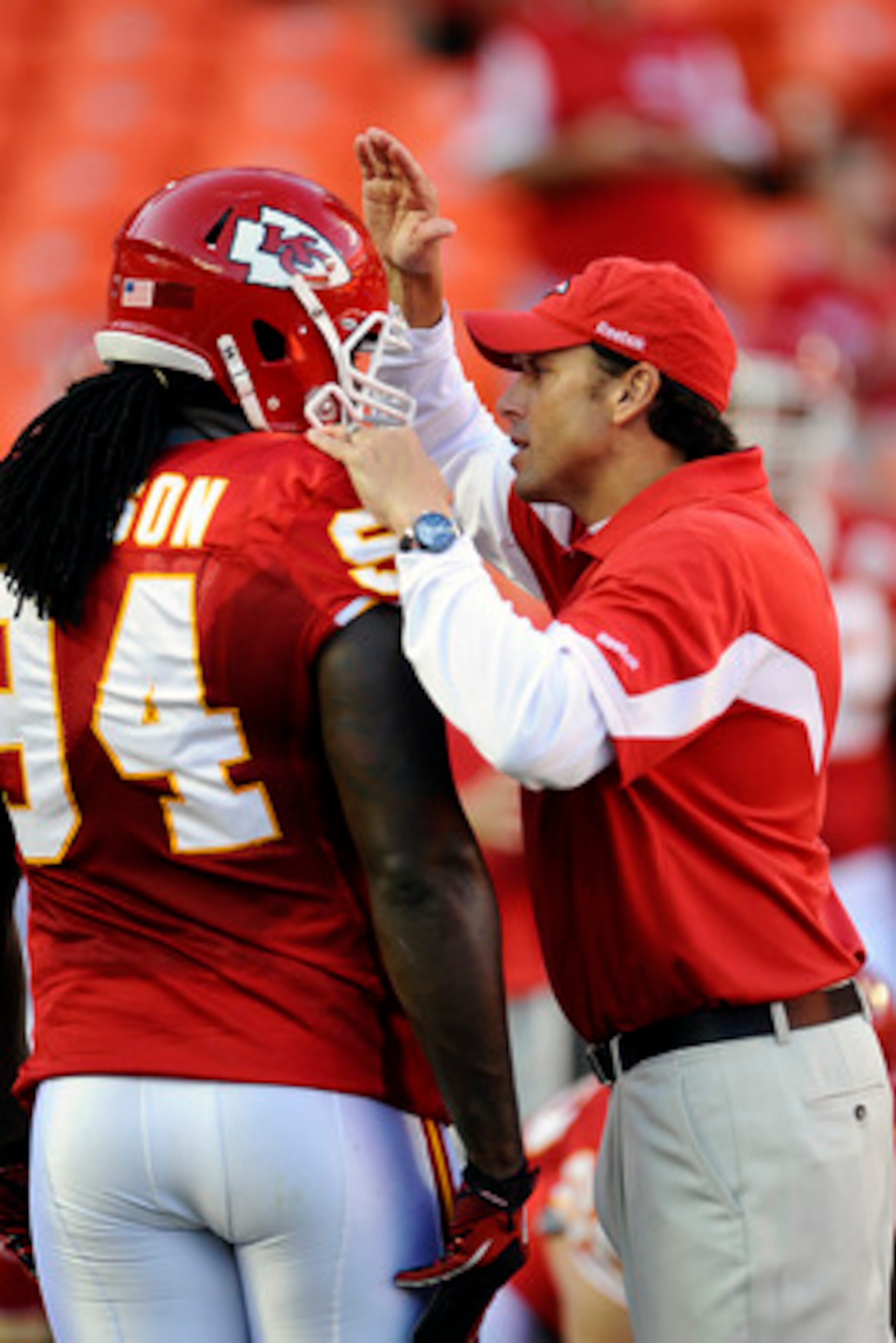 KANSAS CITY, MO - AUGUST 27: Head coach Todd Haley of the Kansas City Chiefs with Tyson Jackson #94 prior to a preseason game against the Philadelphia Eagles at Arrowhead Stadium on August 27, 2010 in Kansas City, Missouri.  (Photo by G. Newman Lowrance/G