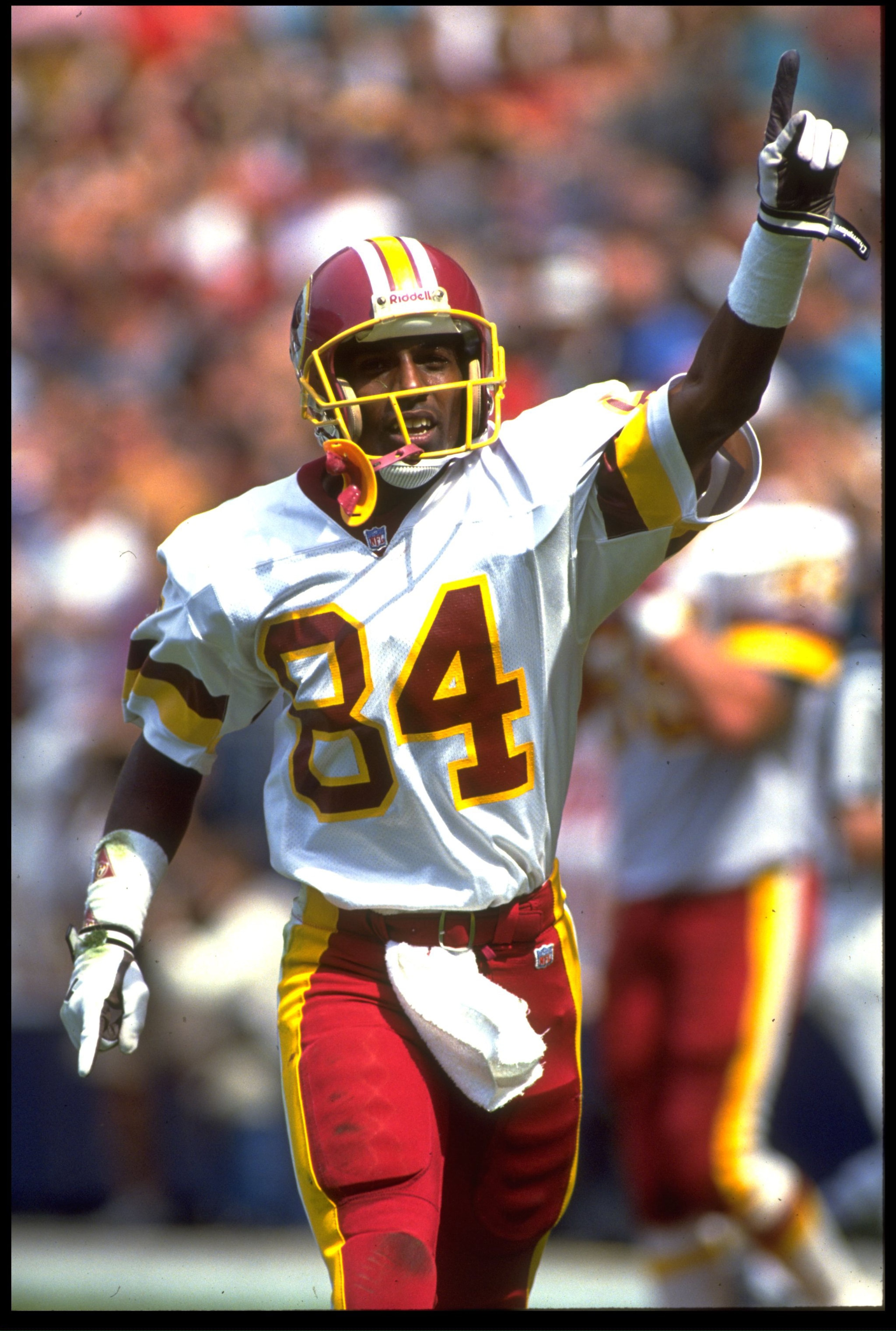 13 SEP 1992:  WASHINGTON REDSKINS WIDE RECEIVER GARY CLARK POINTS TO THE CROWD IN CELEBRATION DURING A 24-17 OVER THE ATLANTA FALCONS AT RFK STADIUM IN WASHINGTON D.C.