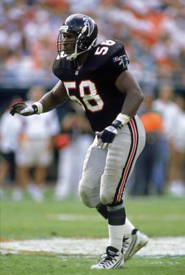 MIAMI, FL - DECEMBER 3:  Linebacker Jessie Tuggle #58 of the Atlanta Falcons focuses on the play during an NFL game against the Miami Dolphins at Joe Robbie Stadium on December 3, 1995 in Miami, Florida.  (Photo by Scott Halleran/Getty Images)