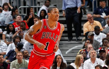 ATLANTA, GA - MAY 12:  Derrick Rose #1 of the Chicago Bulls reacts after scoring a basket against the Atlanta Hawks in Game Six of the Eastern Conference Semifinals in the 2011 NBA Playoffs at Phillips Arena on May 12, 2011 in Atlanta, Georgia.  NOTE TO U