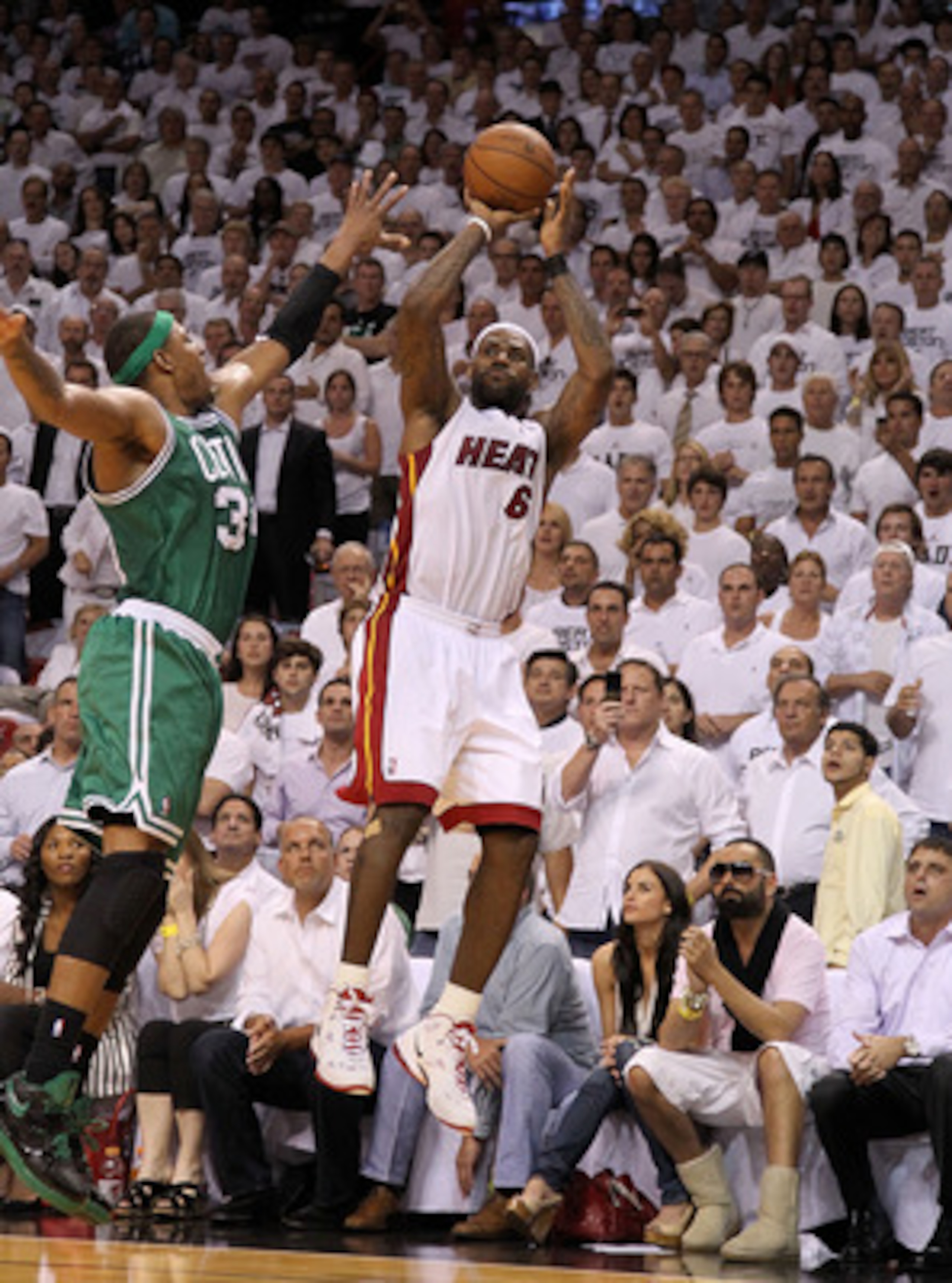 MIAMI, FL - MAY 11:  LeBron James #6 of the Miami Heat hits a late 3 pointer over Paul Pierce #34 of the Boston Celtics during Game Five of the Eastern Conference Semifinals of the 2011 NBA Playoffs at American Airlines Arena on May 11, 2011 in Miami, Flo