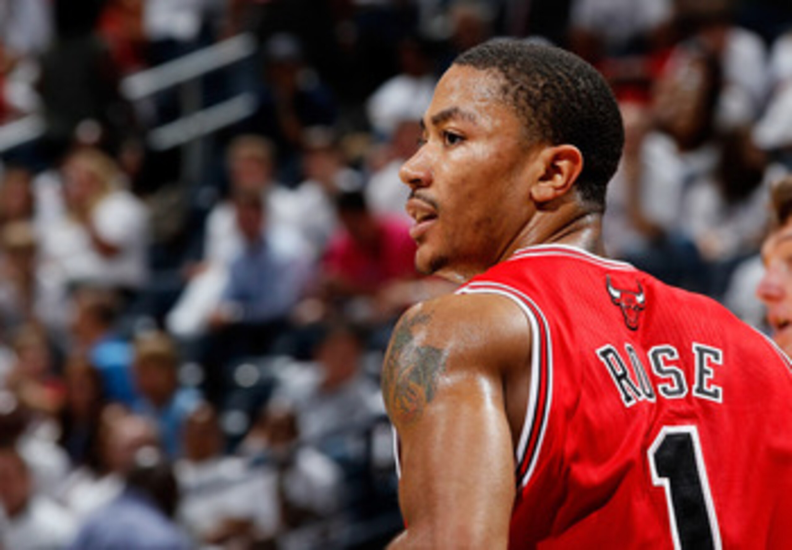 ATLANTA, GA - MAY 12:  Derrick Rose #1 of the Chicago Bulls pushes the ball up the court against the Atlanta Hawks in Game Six of the Eastern Conference Semifinals in the 2011 NBA Playoffs at Phillips Arena on May 12, 2011 in Atlanta, Georgia.  NOTE TO US