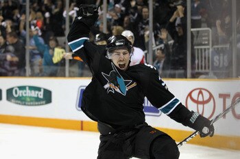 SAN JOSE, CA - MAY 08: Logan Couture #39 of the San Jose Sharks celebrates after he scored a goal to put the Sharks up 3-1 over the Detroit Red Wings in Game Five of the Western Conference Semifinals during the 2011 NHL Stanley Cup Playoffs at HP Pavilio SAN JOSE, CA - MAY 08: Logan Couture #39 of the San Jose Sharks celebrates after he scored a goal to put the Sharks up 3-1 over the Detroit Red Wings in Game Five of the Western Conference Semifinals during the 2011 NHL Stanley Cup Playoffs at HP Pavilio
