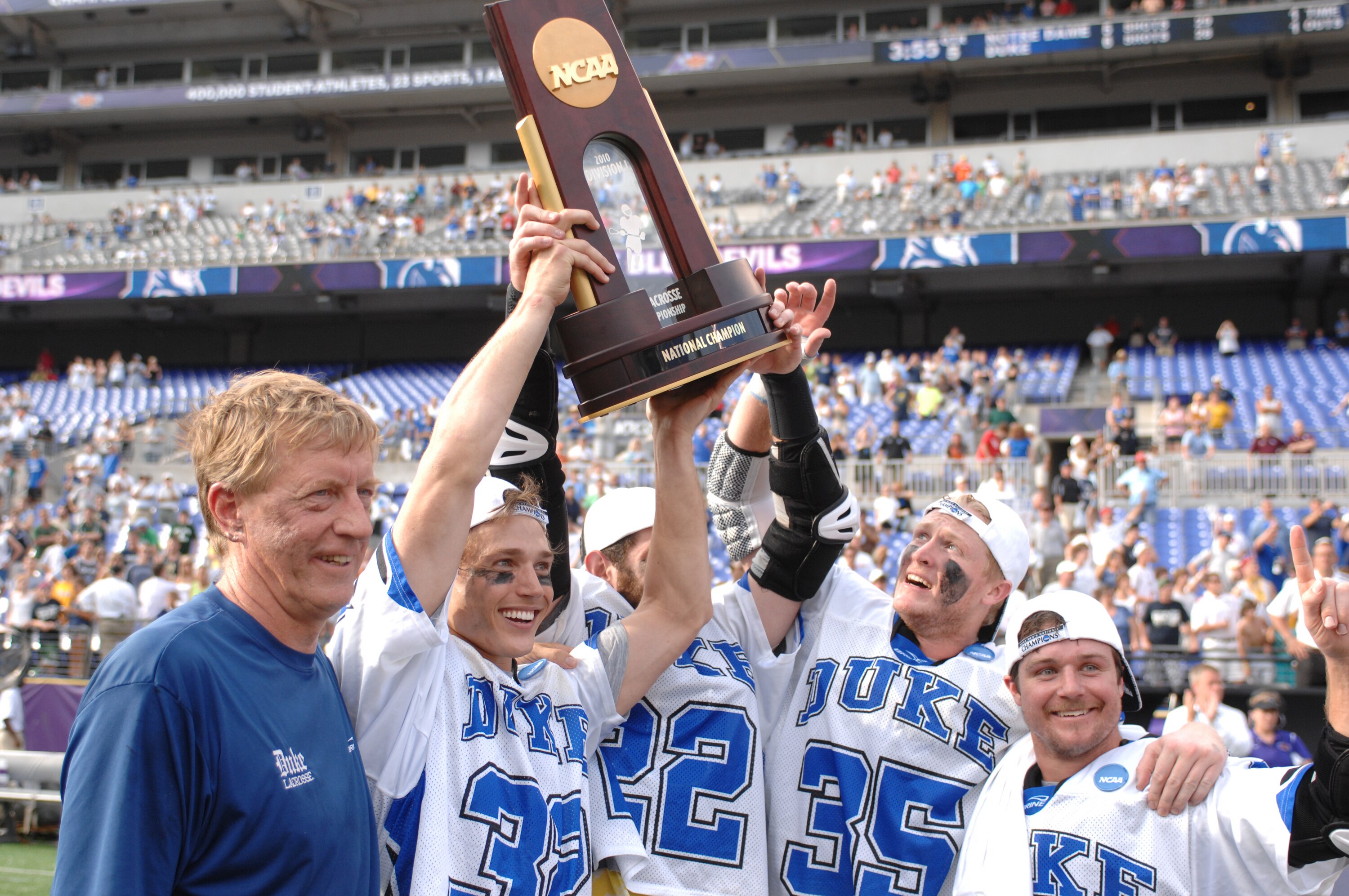 BALTIMORE, MD - MAY 31:  Head coach John Danowski, Sam Payton #32, Ned Crotty #22, Parker McKee #35, and Max Quinzani #9 of the Duke Blue Devils celebrate winning the 2010 NCAA Division 1 Lacrosse Championship against the Notre Dame Fighting Irish on May