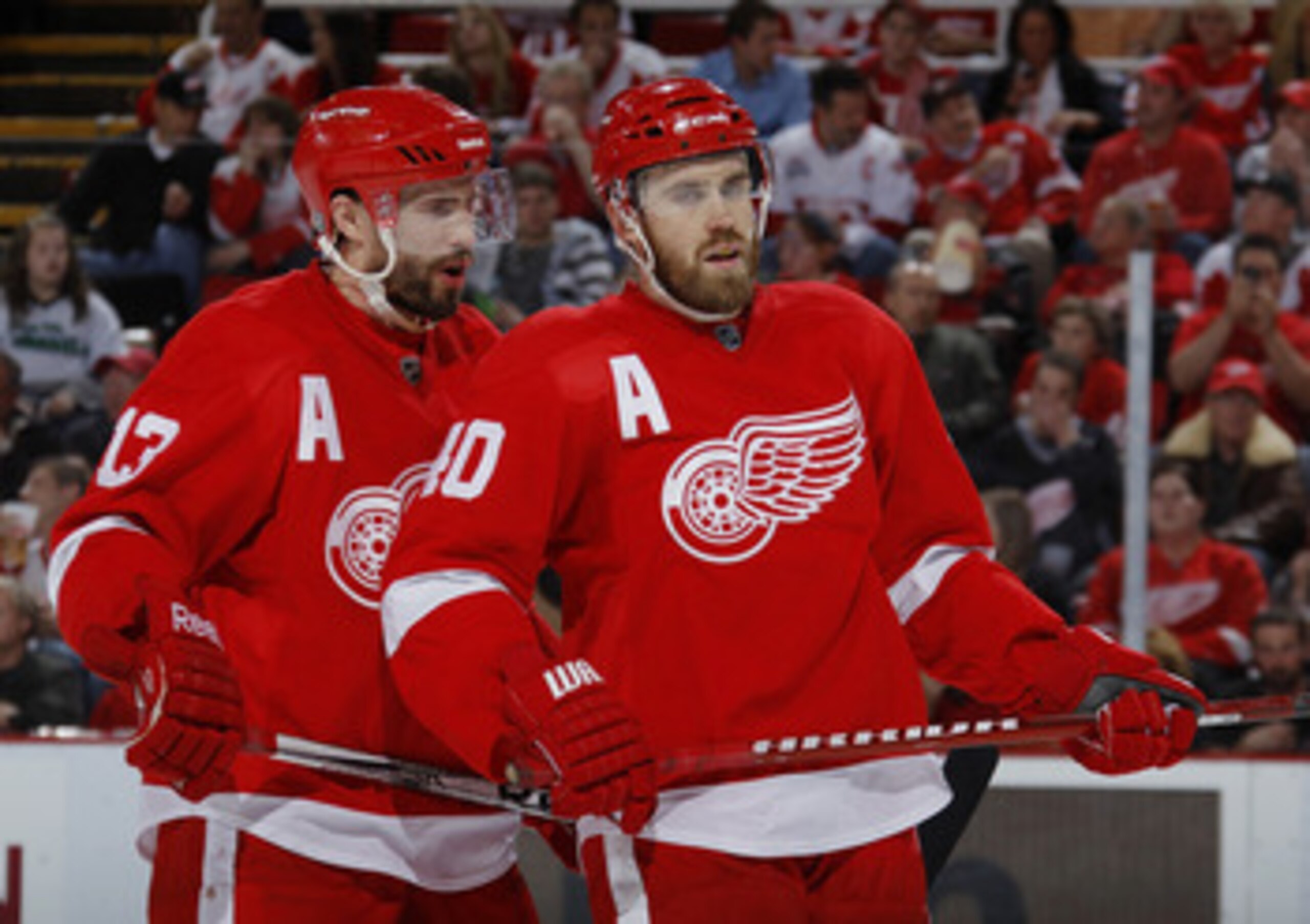 DETROIT - MAY 10: Pavel Datsyuk #13 and Henrik Zetterberg #40 of the Detroit Red Wings talk during the second period while playing the San Jose Sharks in Game Six of the Western Conference Semifinals during the 2011 NHL Stanley Cup Playoffs on May 10, 201