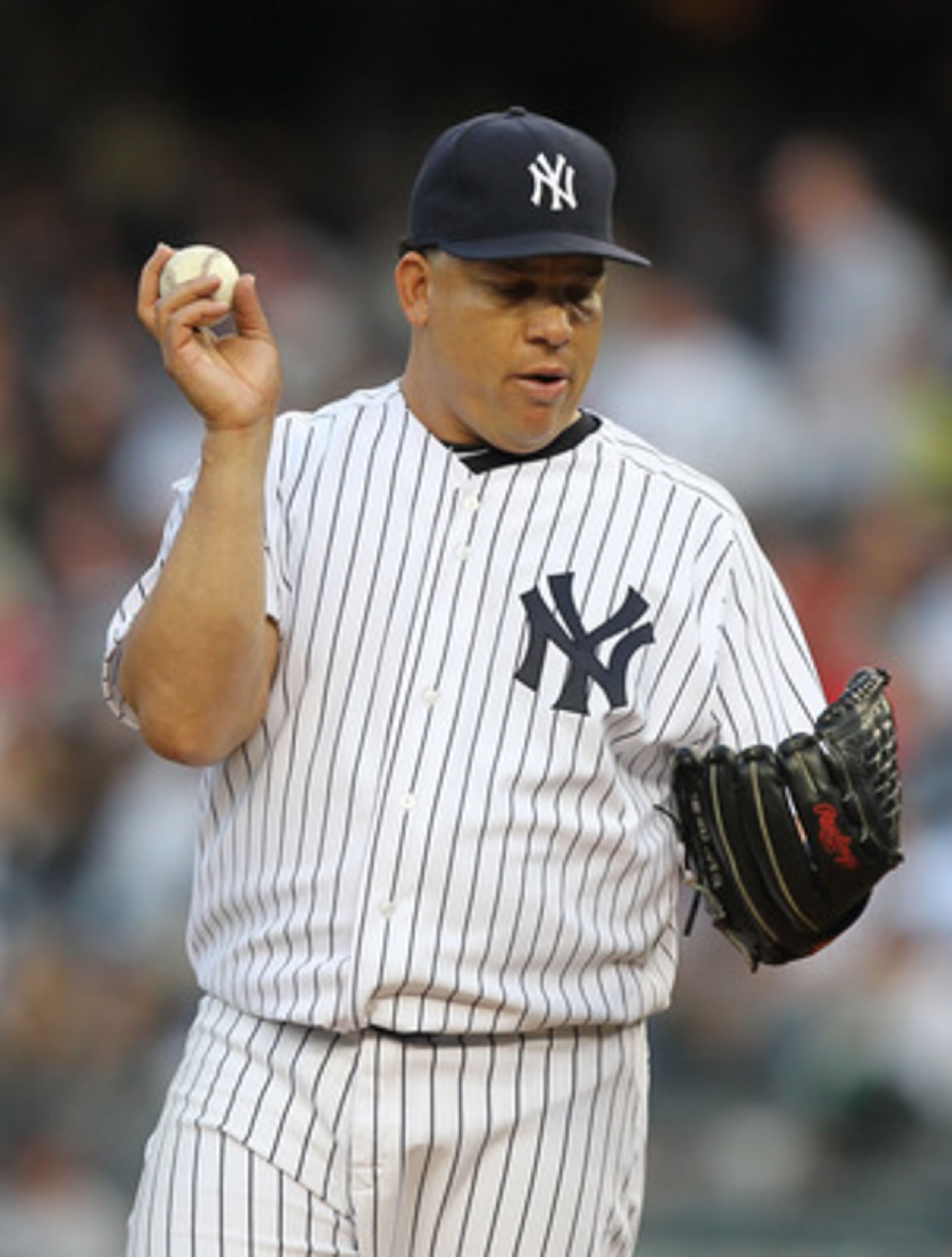 NEW YORK, NY - MAY 13: Bartolo Colon #40 of the New York Yankees stands between pitches against the Boston Red Sox during their game on May 13, 2011 at Yankee Stadium in the Bronx borough of New York City. (Photo by Al Bello/Getty Images) NEW YORK, NY - MAY 13: Bartolo Colon #40 of the New York Yankees stands between pitches against the Boston Red Sox during their game on May 13, 2011 at Yankee Stadium in the Bronx borough of New York City. (Photo by Al Bello/Getty Images)