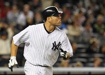 NEW YORK, NY - MAY 13:  Russell Martin #55 of the New York Yankees hits a two run home run against the Boston Red sox during their game on May 13, 2011 at Yankee Stadium in the Bronx borough of New York City.  (Photo by Al Bello/Getty Images)