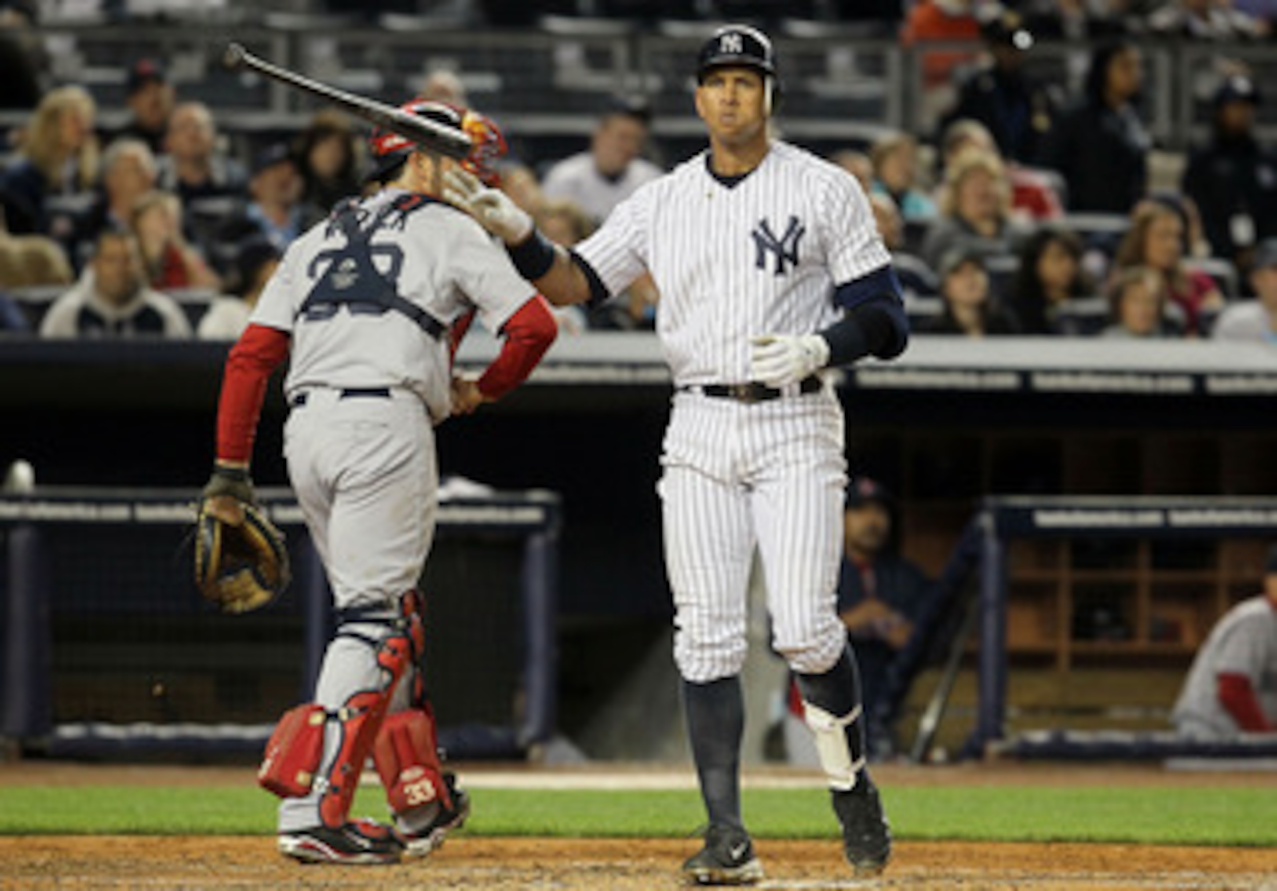 NEW YORK, NY - MAY 14: Alex Rodriguez #13 of the New York Yankees strikes out to end the third inning as Jason Varitek #33 of the Boston Red Sox heads back to the dugout on May 14, 2011 at Yankee Stadium in the Bronx borough of New York City. (Photo by NEW YORK, NY - MAY 14: Alex Rodriguez #13 of the New York Yankees strikes out to end the third inning as Jason Varitek #33 of the Boston Red Sox heads back to the dugout on May 14, 2011 at Yankee Stadium in the Bronx borough of New York City. (Photo by