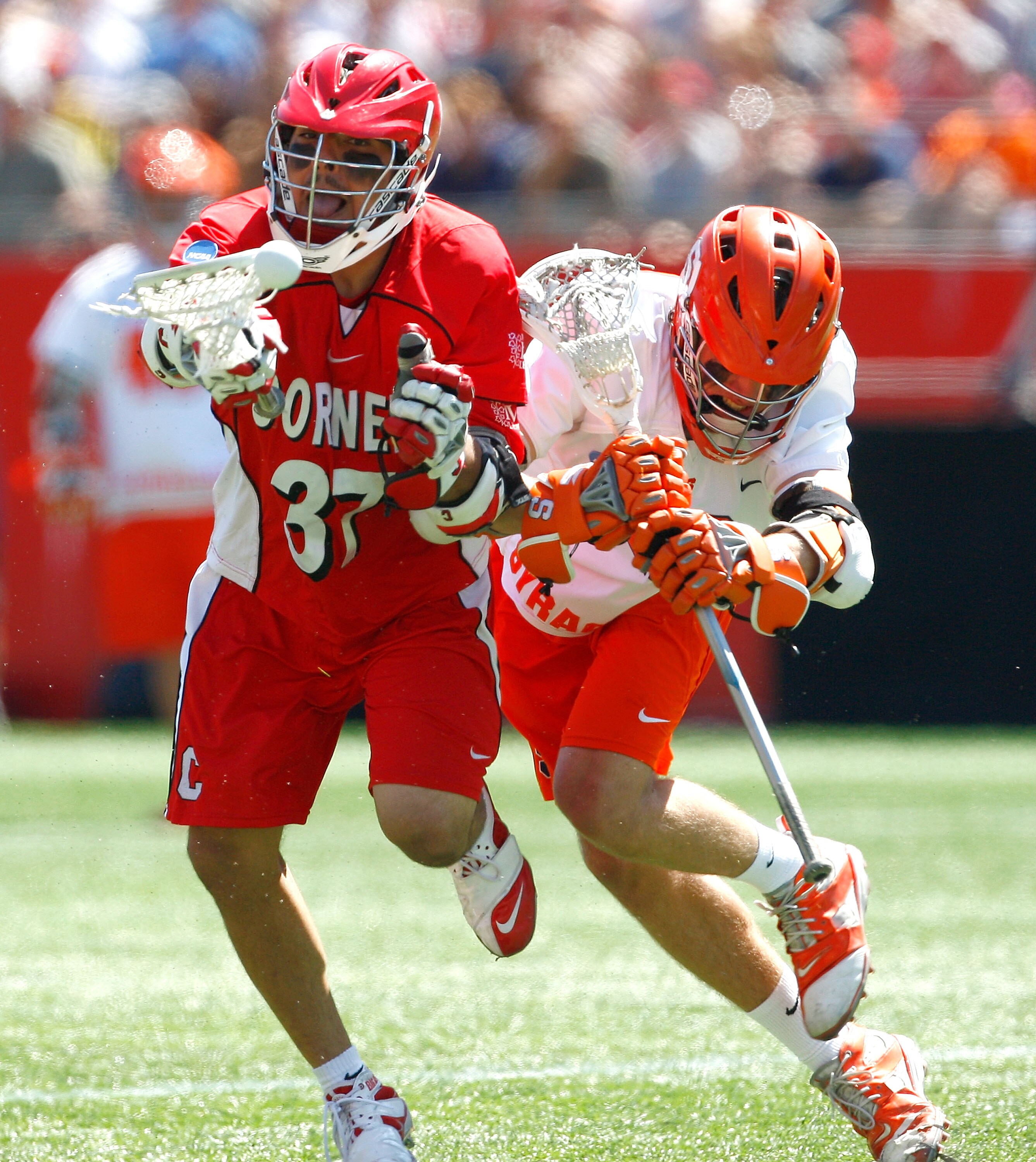 FOXBOROUGH, MA - MAY 25:  Rob Pannell #3 of the Syracuse Orange presses Tyler Hlawati #37 of the Cornell Big Red during the NCAA Division I Lacrosse Championship at Gillette Stadium May 25, 2009 in Foxborough, Massachusetts.  (Photo by Jim Rogash/Getty Im