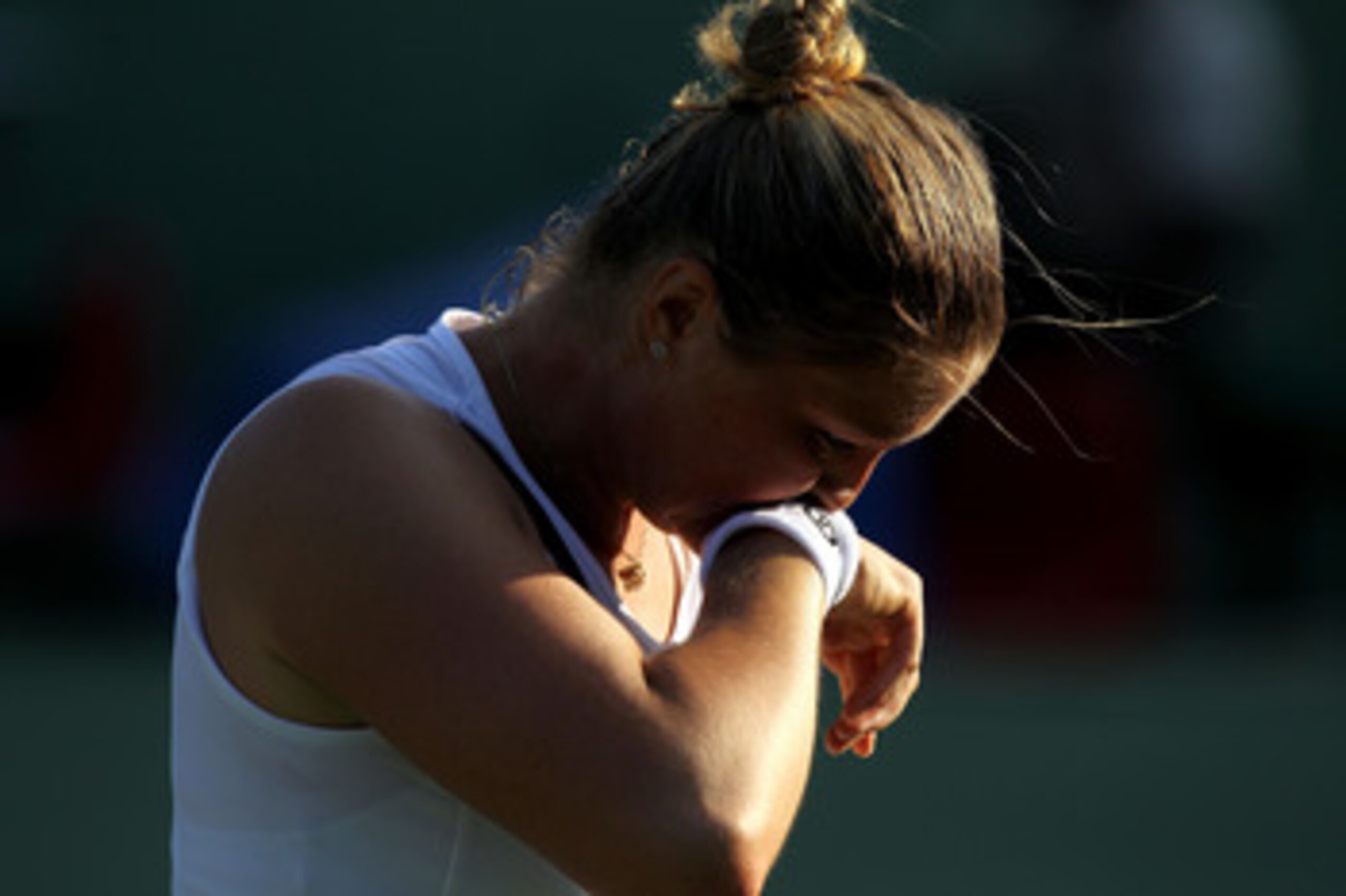 KEY BISCAYNE, FL - MARCH 25: Dinara Safina of Russia wipes sweat off of her face against Vera Zvonareva of Russia during the Sony Ericsson Open at Crandon Park Tennis Center on March 25, 2011 in Key Biscayne, Florida. (Photo by Al Bello/Getty Images) KEY BISCAYNE, FL - MARCH 25: Dinara Safina of Russia wipes sweat off of her face against Vera Zvonareva of Russia during the Sony Ericsson Open at Crandon Park Tennis Center on March 25, 2011 in Key Biscayne, Florida. (Photo by Al Bello/Getty Images)