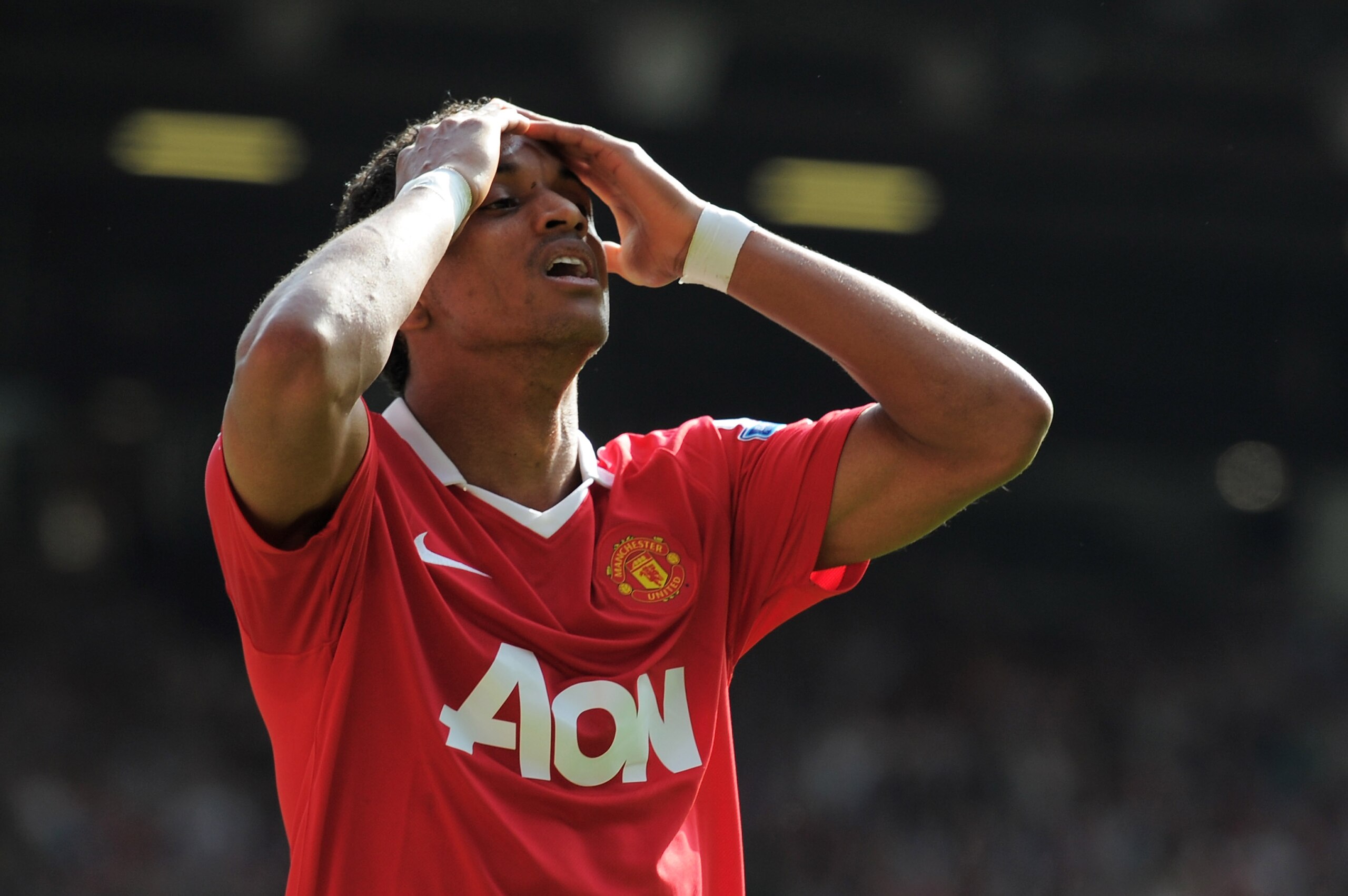 MANCHESTER, ENGLAND - APRIL 09:  Nani of Manchester United holds his head during the Barclays Premier League match between Manchester United and Fulham at Old Trafford on April 9, 2011 in Manchester, England.  (Photo by Michael Regan/Getty Images)