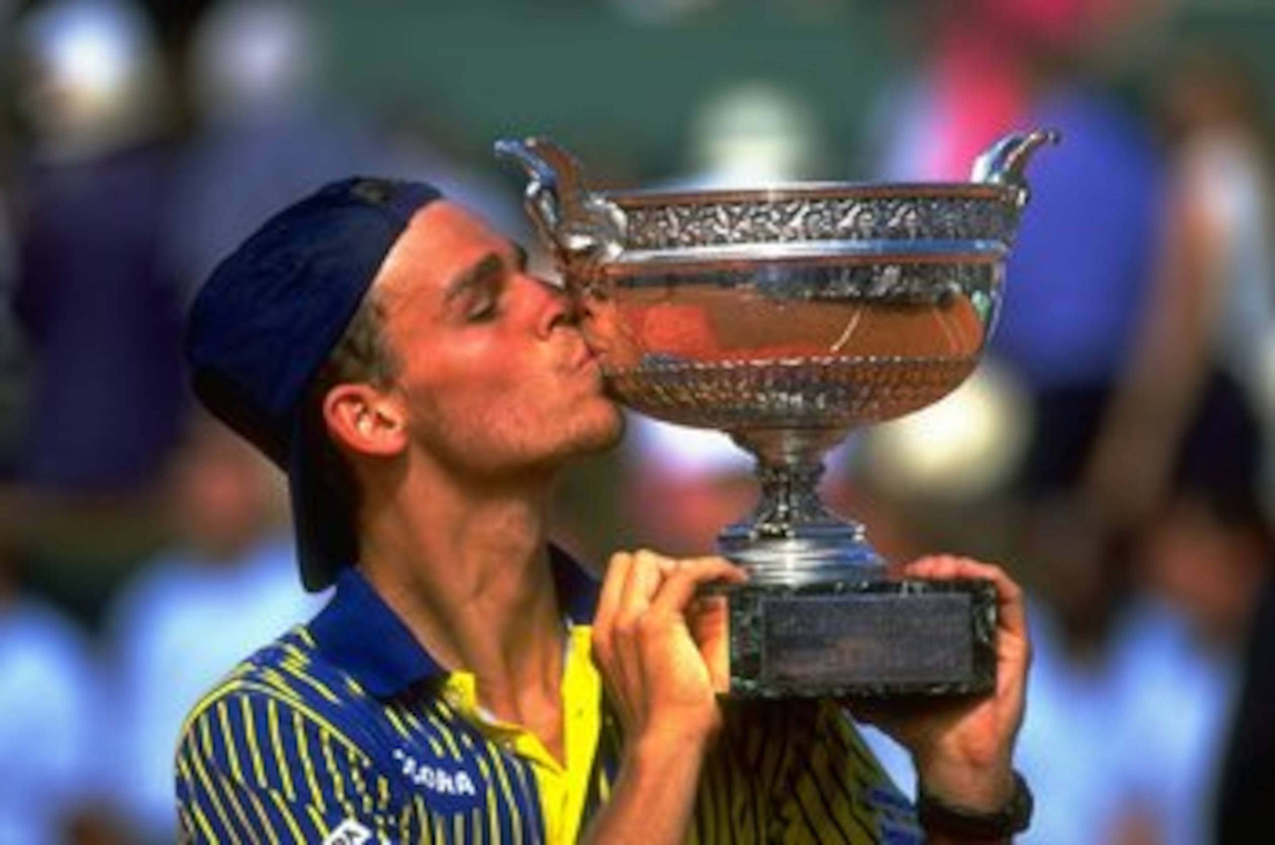 8 Jun 1997: Gustavo Kuerten of Brazil kisses the French Open Trophy after victory against Sergi Bruguera of Spain at Roland Garros Stadium in Paris, France. \ Mandatory Credit: Gary M Prior/Allsport 8 Jun 1997: Gustavo Kuerten of Brazil kisses the French Open Trophy after victory against Sergi Bruguera of Spain at Roland Garros Stadium in Paris, France. \ Mandatory Credit: Gary M Prior/Allsport